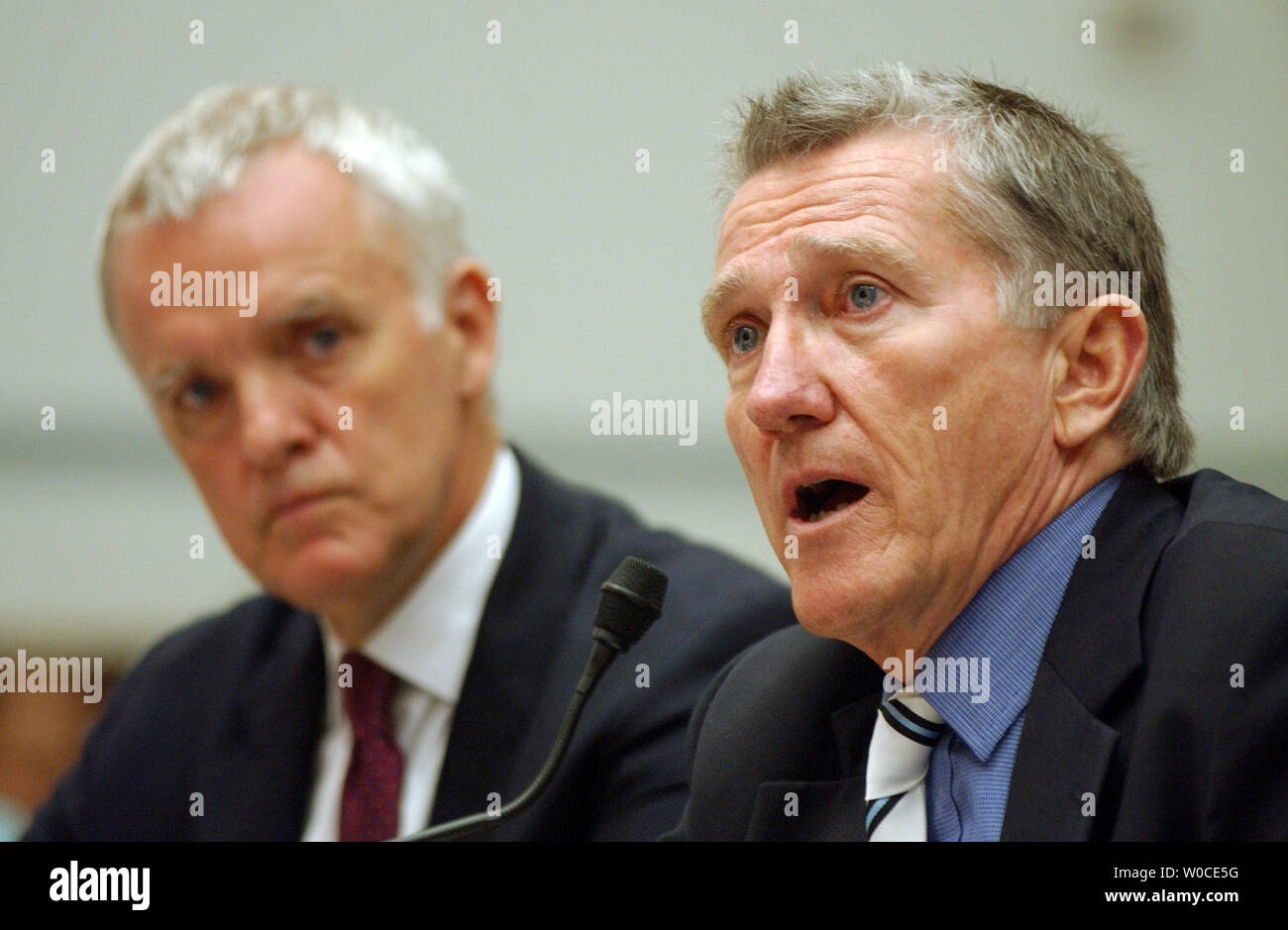 Bob Kerrey, left, and John Lehman, commissioners on the 9-11 Commission testify before the House Government Reform Committee about the 9-11 Commission's recommendations.     (UPI Photo/Roger L. Wollenberg) Stock Photo