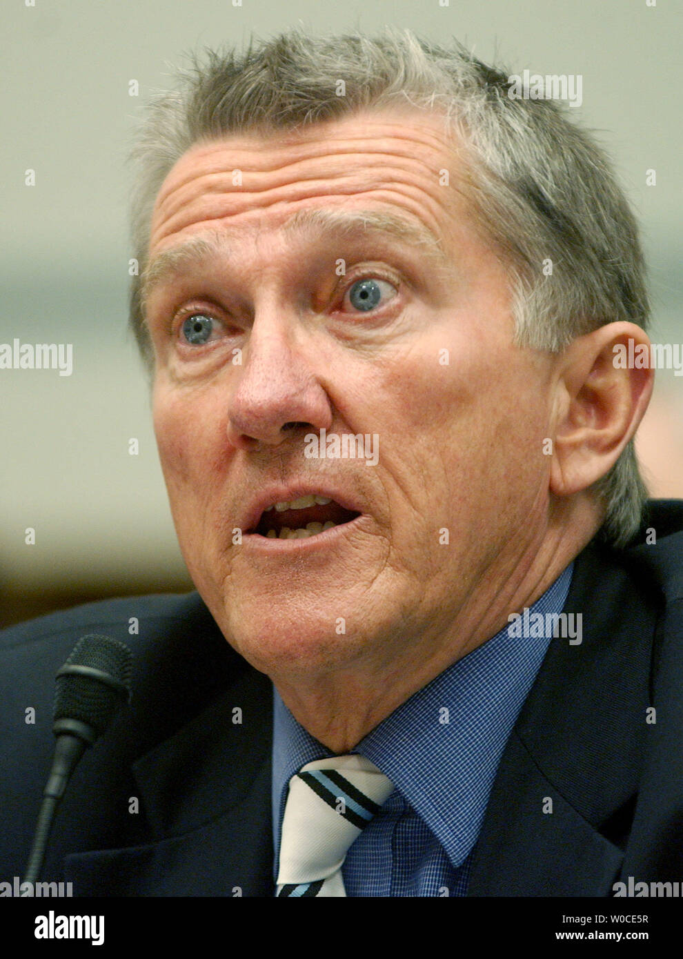 John Lehman, commissioner on the 9-11 Commission testifies before the House Government Reform Committee about the 9-11 Commission's recommendations.     (UPI Photo/Roger L. Wollenberg) Stock Photo