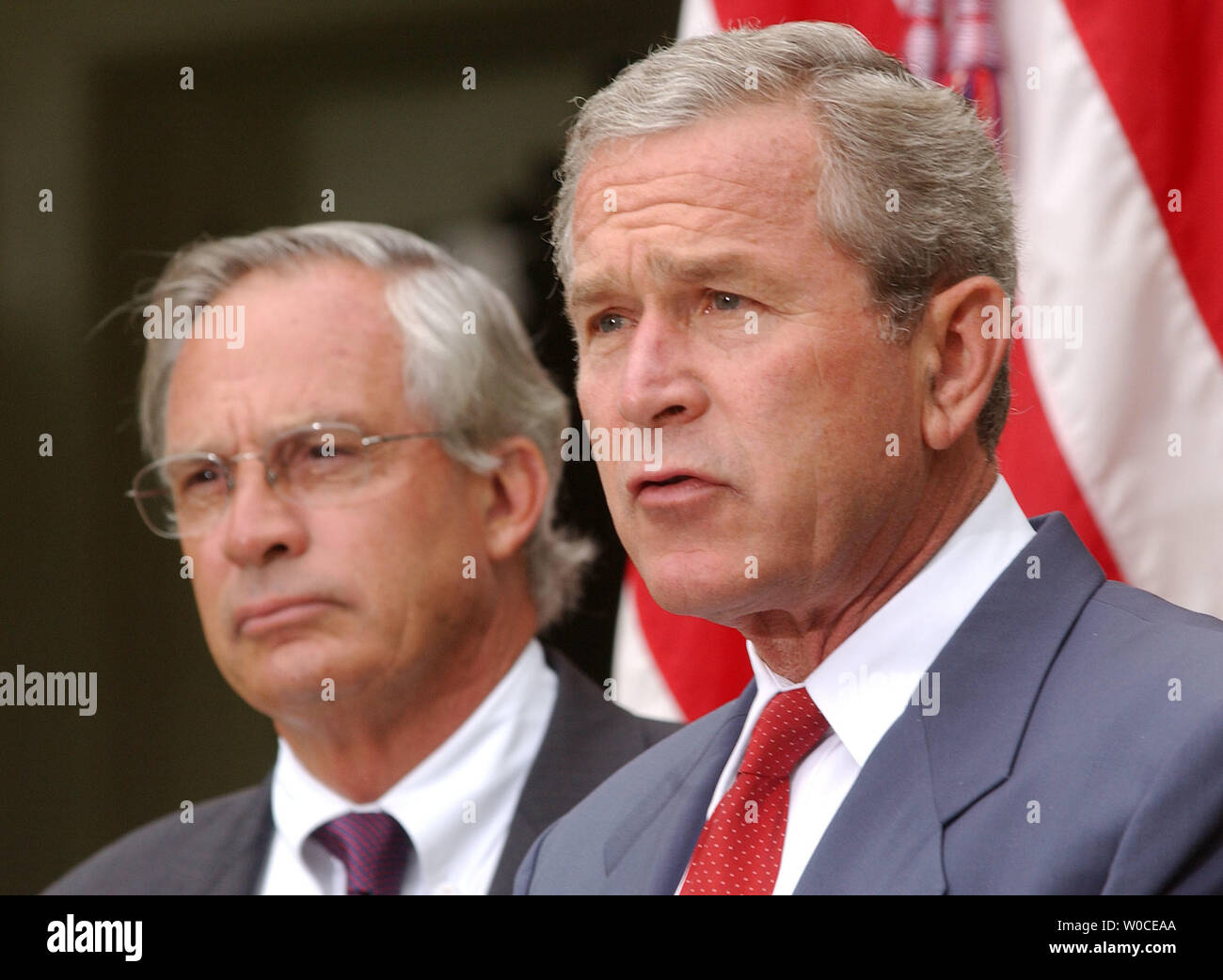 President George W. Bush announces to members of the press that he is nominating Rep. Porter Goss, left, R-FL, as the new head of the CIA, on August 10, 2004 in Washington. Goss is a former member of the CIA and sits on the House of Representatives Intelligence Committee. (UPI Photo/Michael Kleinfeld) Stock Photo