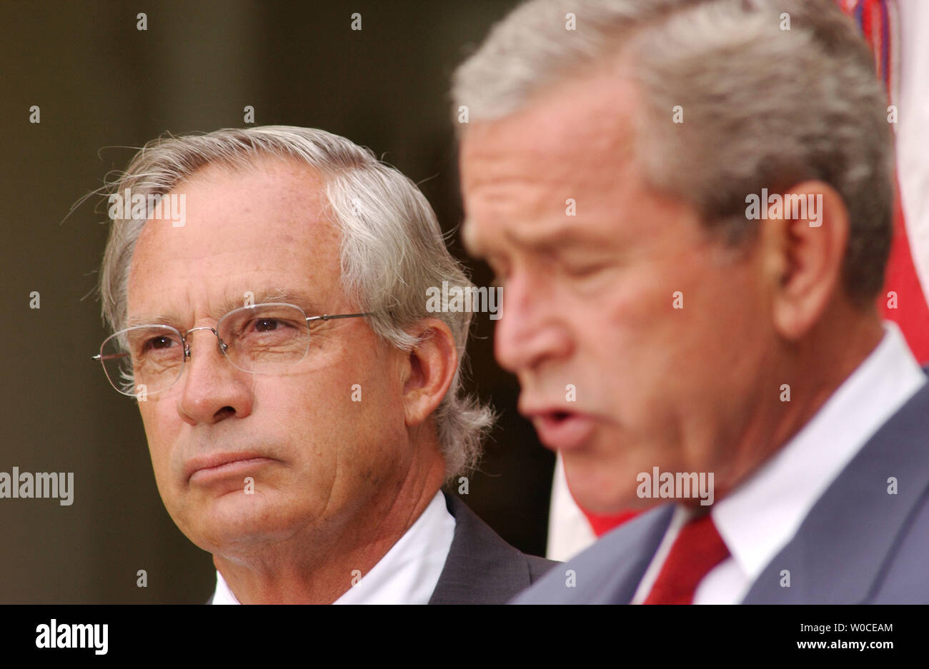 President George W. Bush announces to members of the press that he is nominating Rep. Porter Goss, left, R-FL, as the new head of the CIA, on August 10, 2004 in Washington. Goss is a former member of the CIA and sits on the House of Representatives Intelligence Committee. (UPI Photo/Michael Kleinfeld) Stock Photo