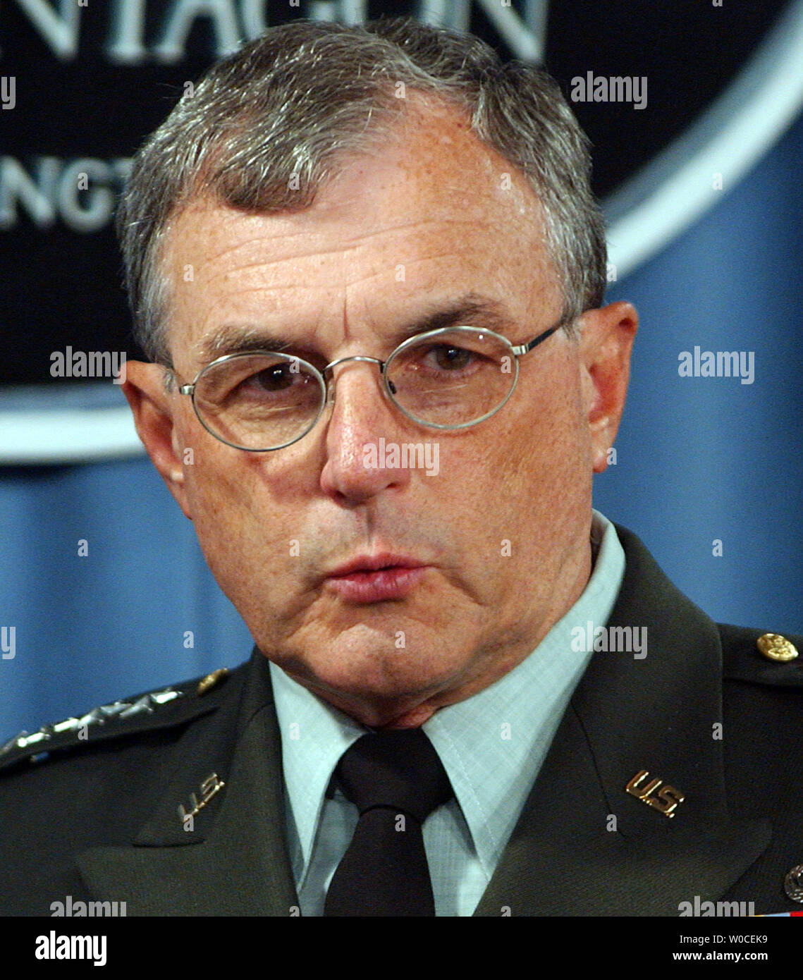 Gen. Paul Kern answers questions from reporters about abuse at the Abu Ghraib prison in Iraq during a news conference at the Pentagon on Aug. 25, 2004, in Arlington, Va. The Defense Department investigation found that less than 50 individuals were to blame for the abuses, but that officers above them in the chain of command made errors that led to the conditions that resulted in the abuses.  (UPI Photo/Roger L. Wollenberg) Stock Photo