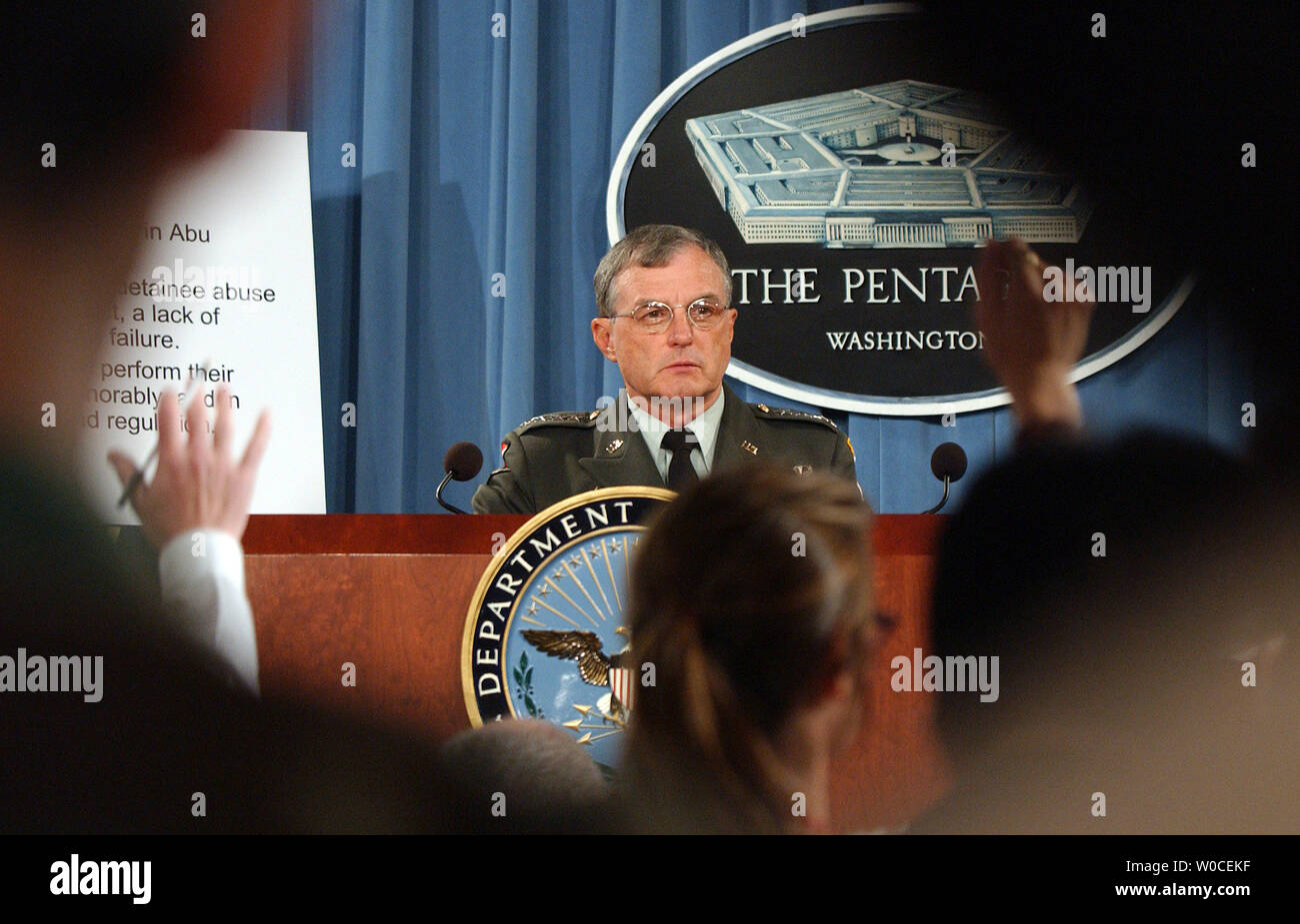 Gen. Paul Kern answers questions from reporters about abuse at the Abu Ghraib prison in Iraq during a news conference at the Pentagon on Aug. 25, 2004, in Arlington, Va. The Defense Department investigation found that less than 50 individuals were to blame for the abuses, but that officers above them in the chain of command made errors that led to the conditions that resulted in the abuses.  (UPI Photo/Roger L. Wollenberg) Stock Photo