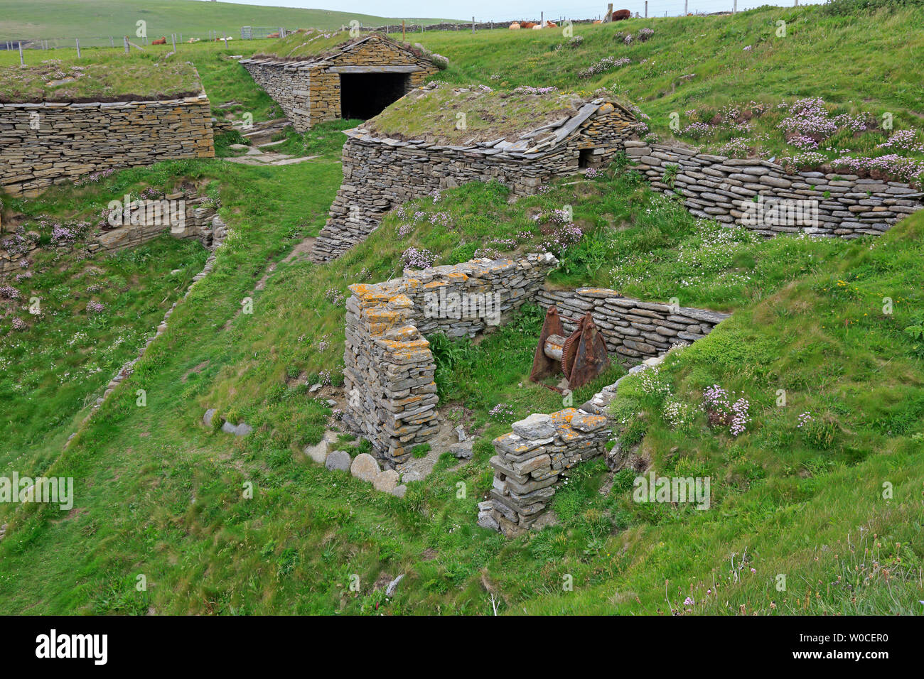 Fisherman's Huts and Boat Nousts at Sand Geo Mainland Orkney Stock Photo