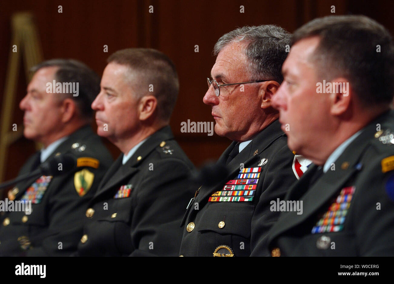 Gen. Paul Kern, center, Lt. Gen. Anthony Jones, right, Maj. Gen. George Fay, left, testify before the Senate Armed Service Committee regarding the abuses of the 205th Military Intelligence Brigade at Abu Ghraib Prison, Iraq.  They said that mistakes were made because of a shortage of soldiers and general chaos. (UPI Photo/Michael Kleinfeld) Stock Photo