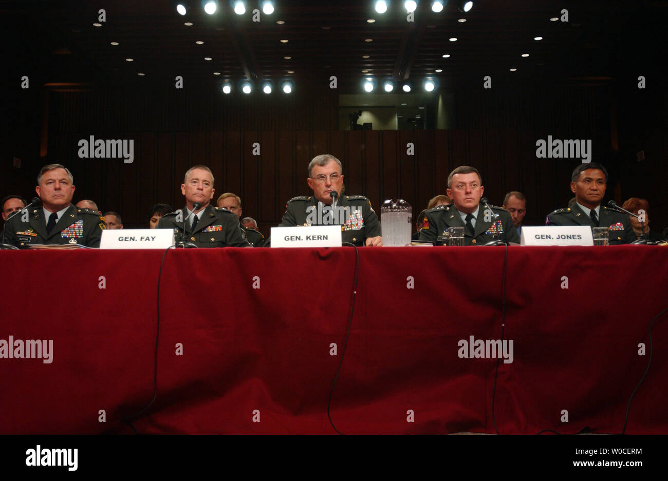 Gen. Paul Kern, center, Lt. Gen. Anthony Jones, right, Maj. Gen. George Fay, left, Maj. Gen. Antonio Taguba, far right, and , far left, testify before the Senate Armed Service Committee regarding the abuses of the 205th Military Intelligence Brigade at Abu Ghraib Prison, Iraq.  They said that mistakes were made because of a shortage of soldiers and general chaos. (UPI Photo/Michael Kleinfeld) Stock Photo