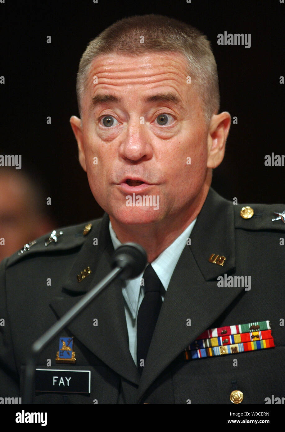 Maj. Gen. George Fay testifies before the Senate Armed Service Committee regarding the abuses of the 205th Military Intelligence Brigade at Abu Ghraib Prison, Iraq.  He said that mistakes were made because of a shortage of soldiers and general chaos.   (UPI Photo/Michael Kleinfeld) Stock Photo