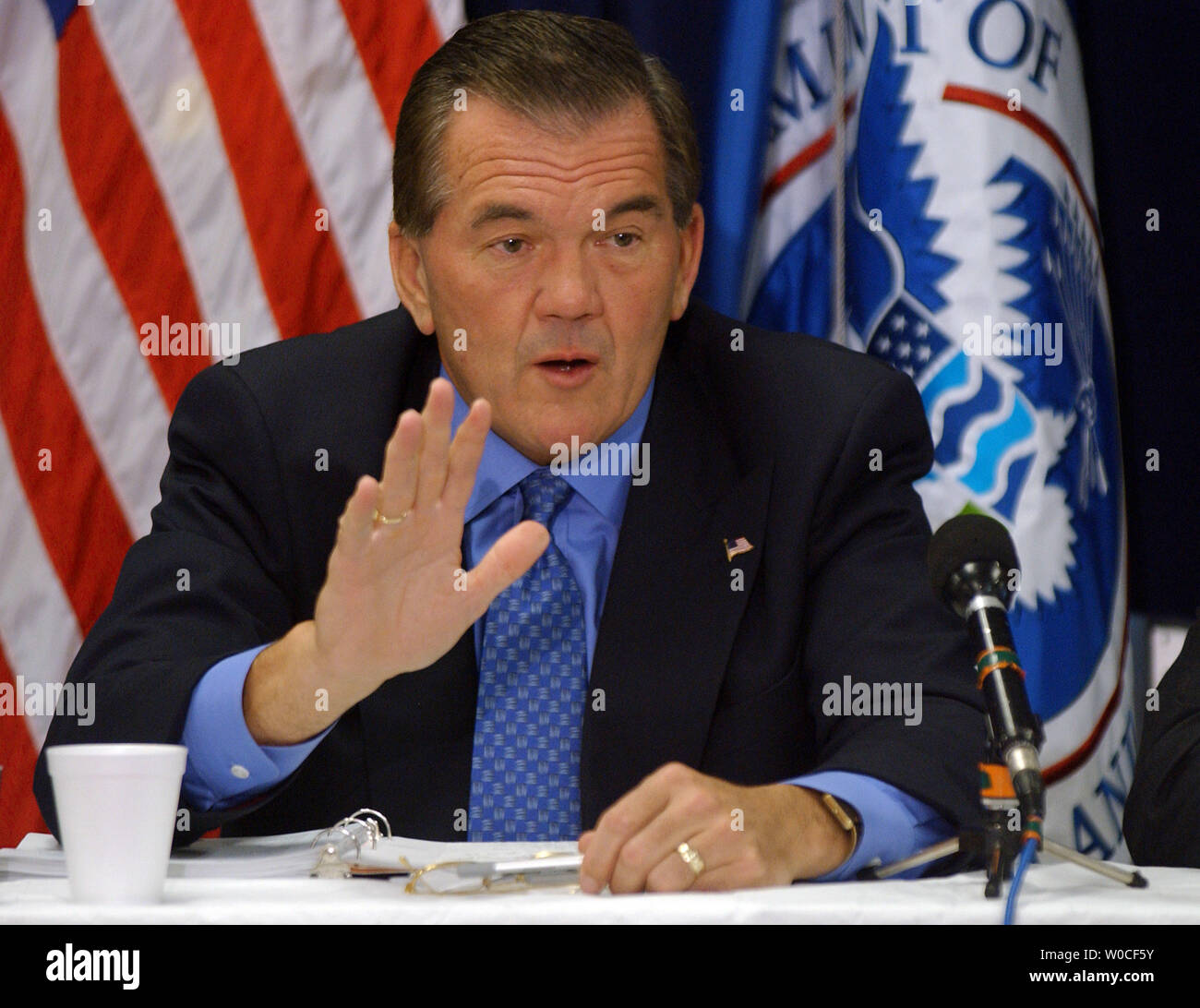 Secretary of Homeland Security Tom Ridge speaks during a meeting of the Homeland Security Advisory Committee (HSAC) at the Coast Guard Headquarters in Washington on Sept. 22, 2004. HSAC, a group of public and private officials, meets regulary to discuss security issues and make recommendations.   (UPI Photo/Roger L. Wollenberg) Stock Photo