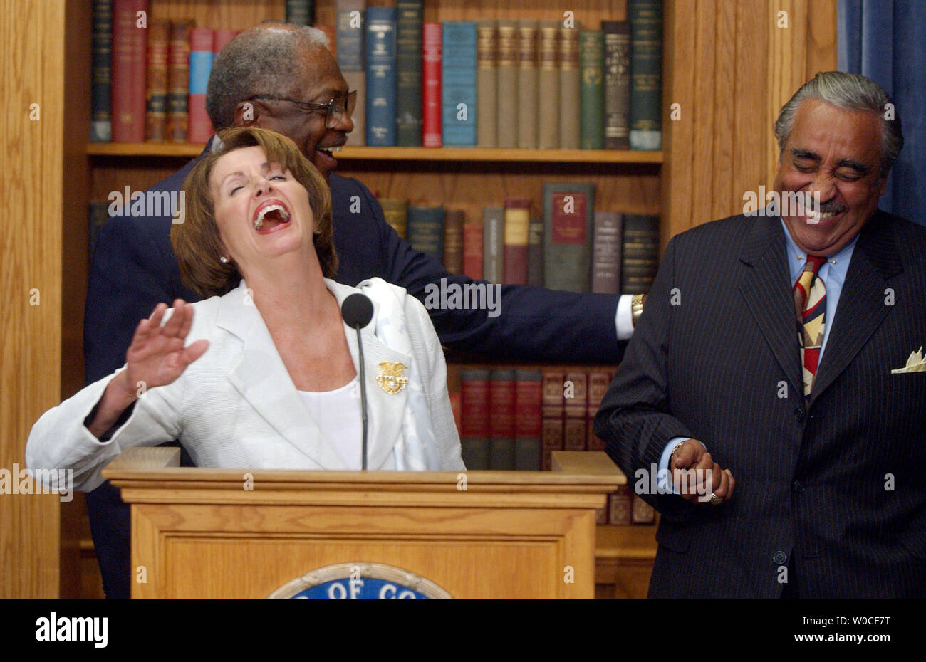 Democratic Reps. Nancy Pelosi, Calif., James Clyburn, N.C., and Charles  Rangel, N.Y., left to right, laugh hysterically after Rangel joked about  the possible price of Depends during a news conference to warn