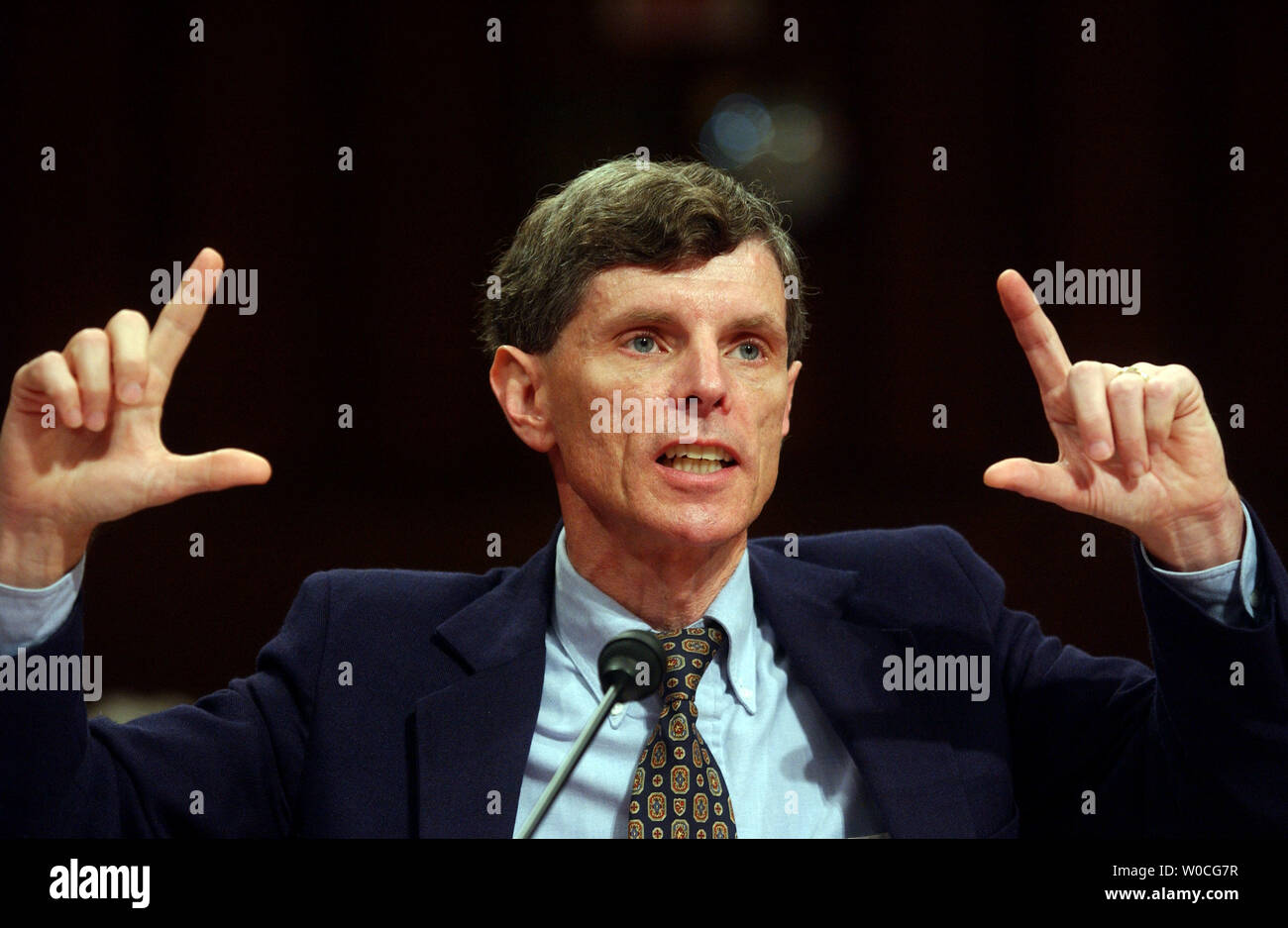 Dr. David J. Graham, MPH, Associate Director for Science, Office of Drug Safety, Center for Drug Evaluation and Research, U.S. Department of Health and Human Services, Food and Drug Administration testifies before the Senate Finance Committee hearing on FDA, Merck, and Vioxx on November 18, 2004 in Washington.  Graham said that Vioxx was a definite threat and that there are at least five drugs on the market he would take off. (UPI Photo/Michael Kleinfeld) Stock Photo