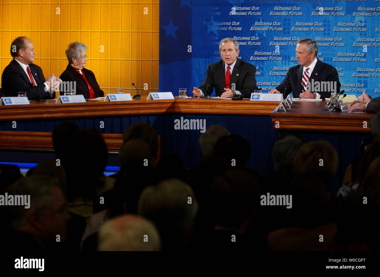 President George W. Bush speaks to those gathered at a White House sponsored conference on the economy at the Reagan Trade Center on December 15, 2004 in Washington. The purpose of the conference is to establish economic consensus and policy for the next four years of the Bush Administration. (UPI Photo/Michael Kleinfeld) Stock Photo