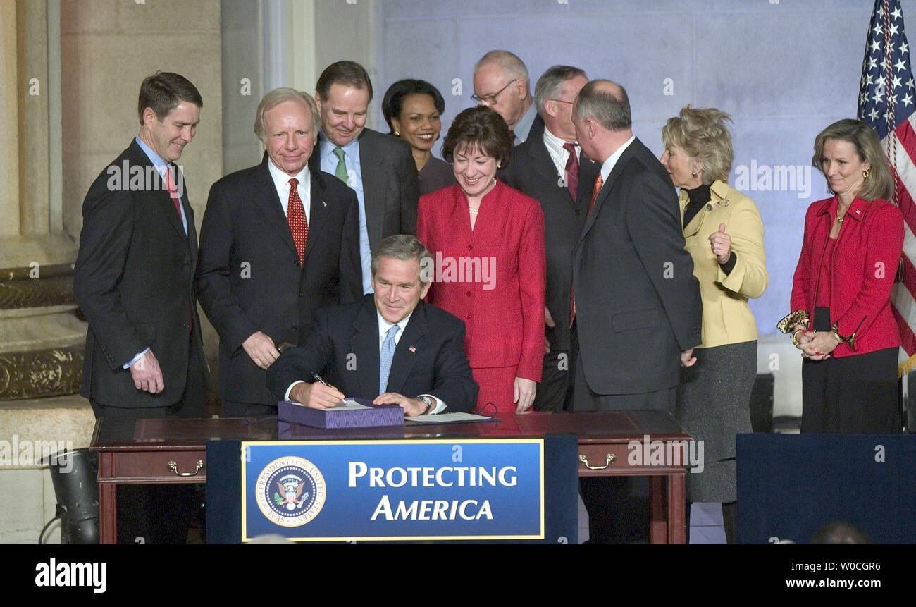 U.S. President George W. Bush signs The Intelligence Reform and Terrorism Prevention Act of 2004 in Washington on Dec. 17, 2004. Behind Bush are, left to right, Senate Majority Leader Bill Frist, R-Tn., Sen. Joe Liberman, D-Ct., 9-11 Commission Chairman Thomas Keane, National Security Advisor Condoleeza Rice, Sen. Susan Collins, R-Me., 9-11 Commission Vice Chair Lee Hamilton, CIA Director Porter Goss, Rep. Pete Hoekstra, R-Mi., Rep. Jane Harman, D-Ca., and Assistant to the President and Homeland Scurity Advisor Frances Fragos Townsend.  (UPI Photo/Roger L. Wollenberg) Stock Photo