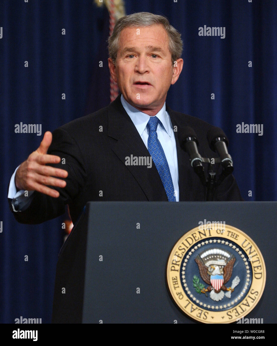 President George W. Bush speaks with members of the White House Press Corps during a final news conference of 2004 on December 20, 2004 in Washington.  Bush discussed domestic issues like Medicare and international issues like the war in Iraq and the Palestinian and Israeli conflict. (UPI Photo/Michael Kleinfeld) Stock Photo