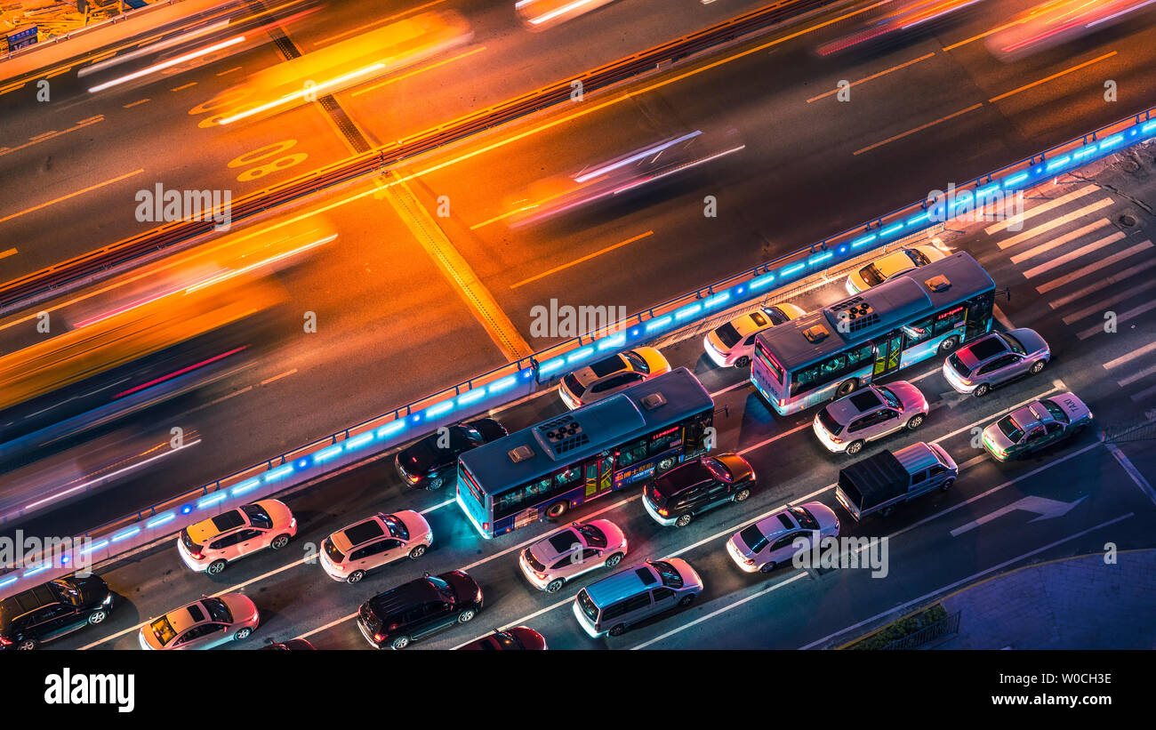 Models and transportation systems, sports expressways, fast roads at night, car speed at night, bus, downtown, dusk in a hurry, quickly light the streets Stock Photo