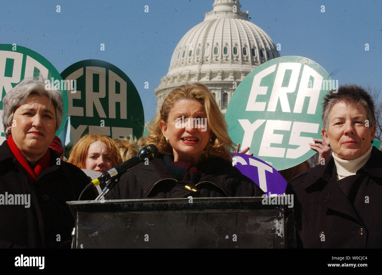 Rep. Carolyn Maloney, D-N.Y, speaks at a news conference to reintroduce the Equal Rights Amendment.to the Consitution on March 15, 2005 in Washington as Elenanor Smeal of Feminist Majority listens in to her left.  Smeal and others are calling for equal rights under the law for women. (UPI Photo/Michael Kleinfeld) Stock Photo