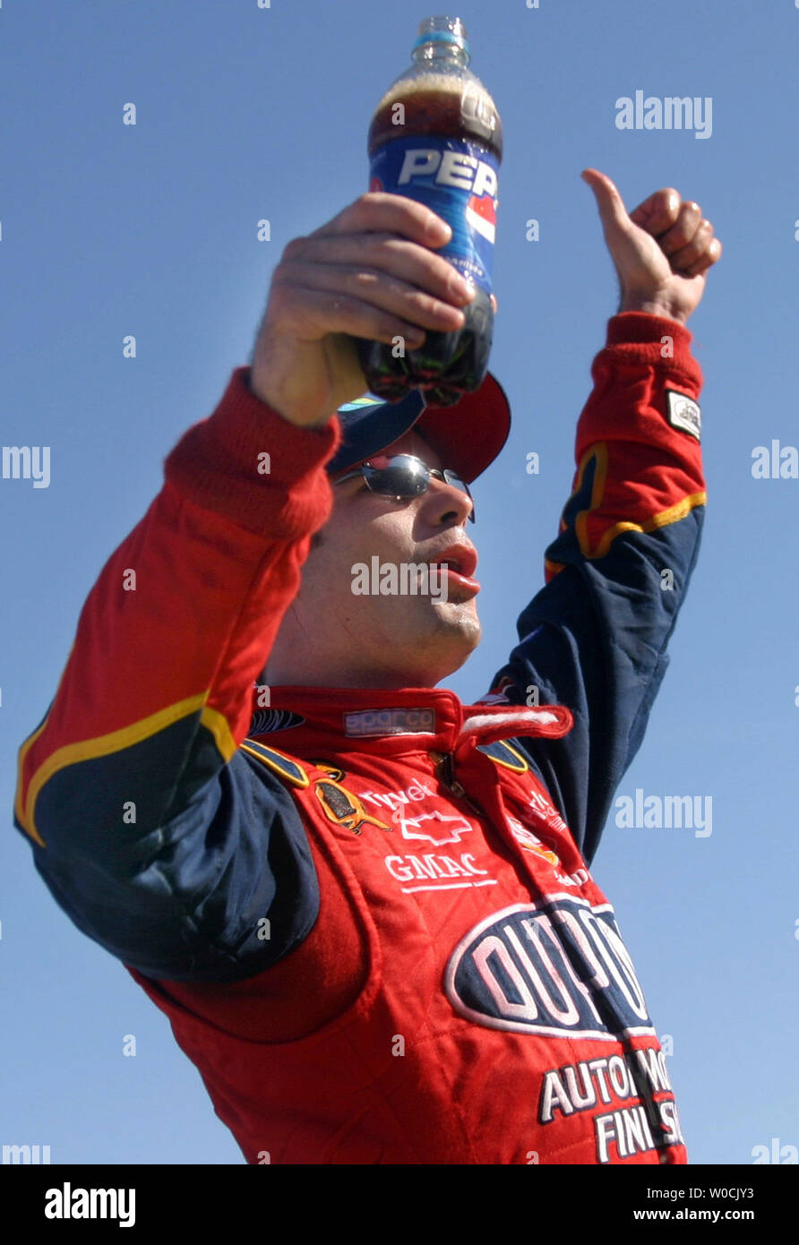 Jeff Gordon (24) of team DuPont celebrates his first place victory in the The Advance Auto Parts 500, held at the Martinsville Speedway in Martinsville, VA, on April 10, 2005.  (UPI Photo/Kevin Dietsch) Stock Photo