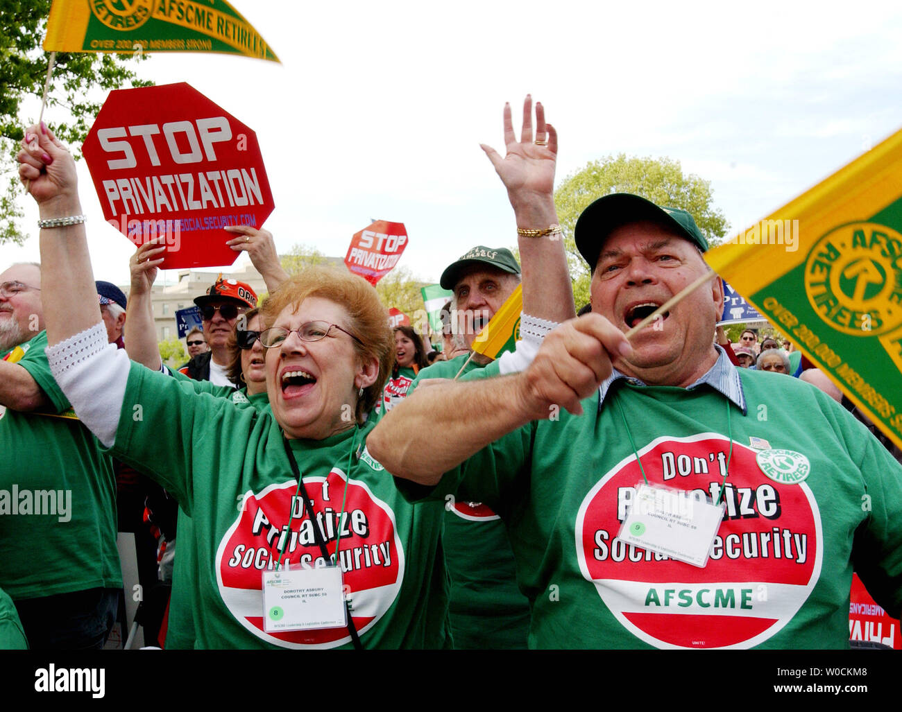 Democratic supporters cheer as Senate and House members take the stage at a rally to keep Social Security away from privatization, on April 26, 2005 in Washington.    Democrats are apposed to President George W. Bush's plan to privatize Social Security, saying it will hurt the average American because it is too risky. (UPI Photo/Michael Kleinfeld) Stock Photo