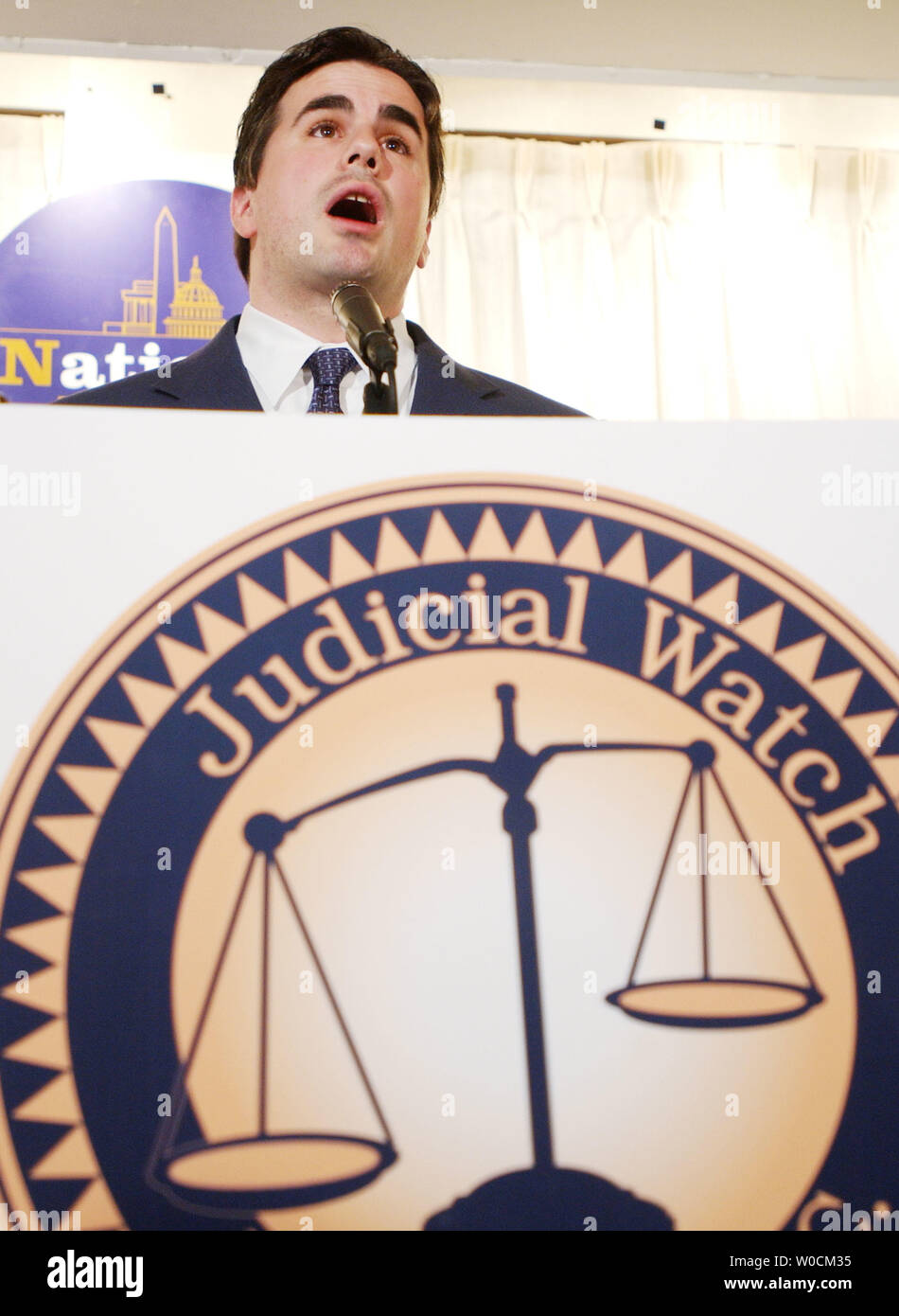 Thomas Fitton, President of Judicial Watch, speaks to those gathered at a news conference to announce he has filed and ethics complaint in the U.S. Senate regarding fundraising by Sen. Hilliary Clinton, D-NY, on May 9, 2005 in Washington.  Judicial Watch says the Senator knew about money that has led to the indictment of her Director of Finance, David Rosen and that she should also be held accountable. (UPI Photo/Michael Kleinfeld) Stock Photo