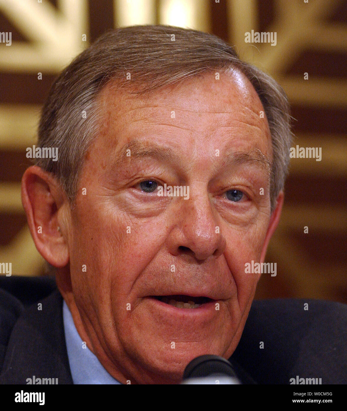 Sen. George Voinovich, R-OH, says 'aye' as he votes to send John Bolton to the Senate floor for a final vote on May 12, 2005, on Capitol Hill in Washington. The Senate Foreign Relations Committee held a five hour meeting to discuss and vote on Bolton, President Bush's nominee to be the U.S. ambassador to the UN.    (UPI Photo/Roger L. Wollenberg) Stock Photo
