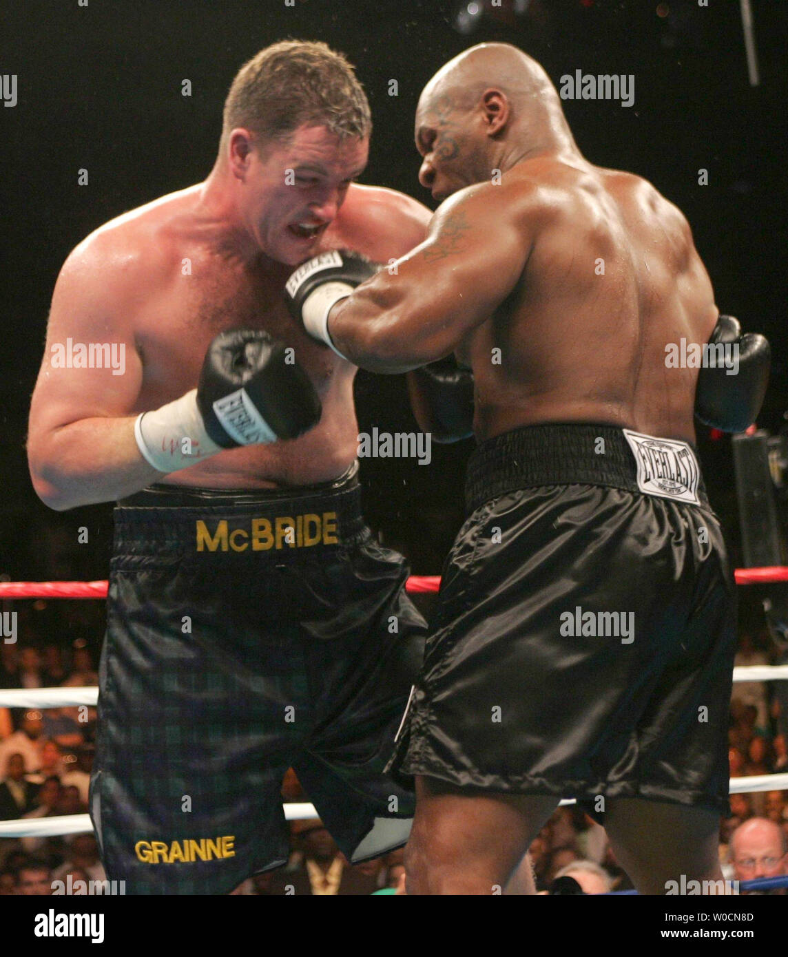 Irish heavyweight champion Kevin McBride bested Iron Mike Tyson with a 6th  round TKO when Tyson could not come out for the 7th round. Tyson attacks  McBride with a solid left hook