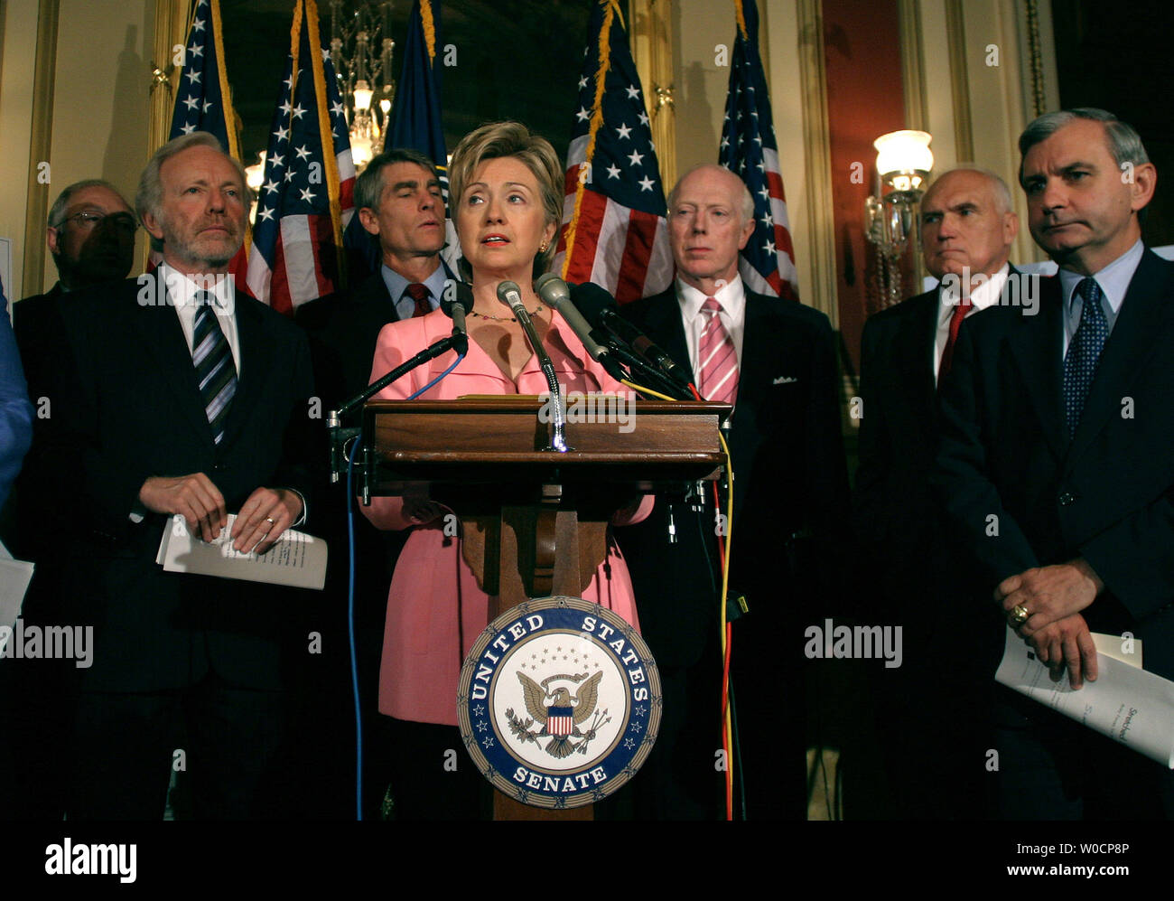 Senator Hillary Clinton (D-NY), flanked by fellow Senator and military officials, announces the passing of the Army Relief Act which would increase the size of America’s army, on Capitol Hill in Washington, DC on July 13, 2005. (UPI Photo/Kevin Dietsch) Stock Photo