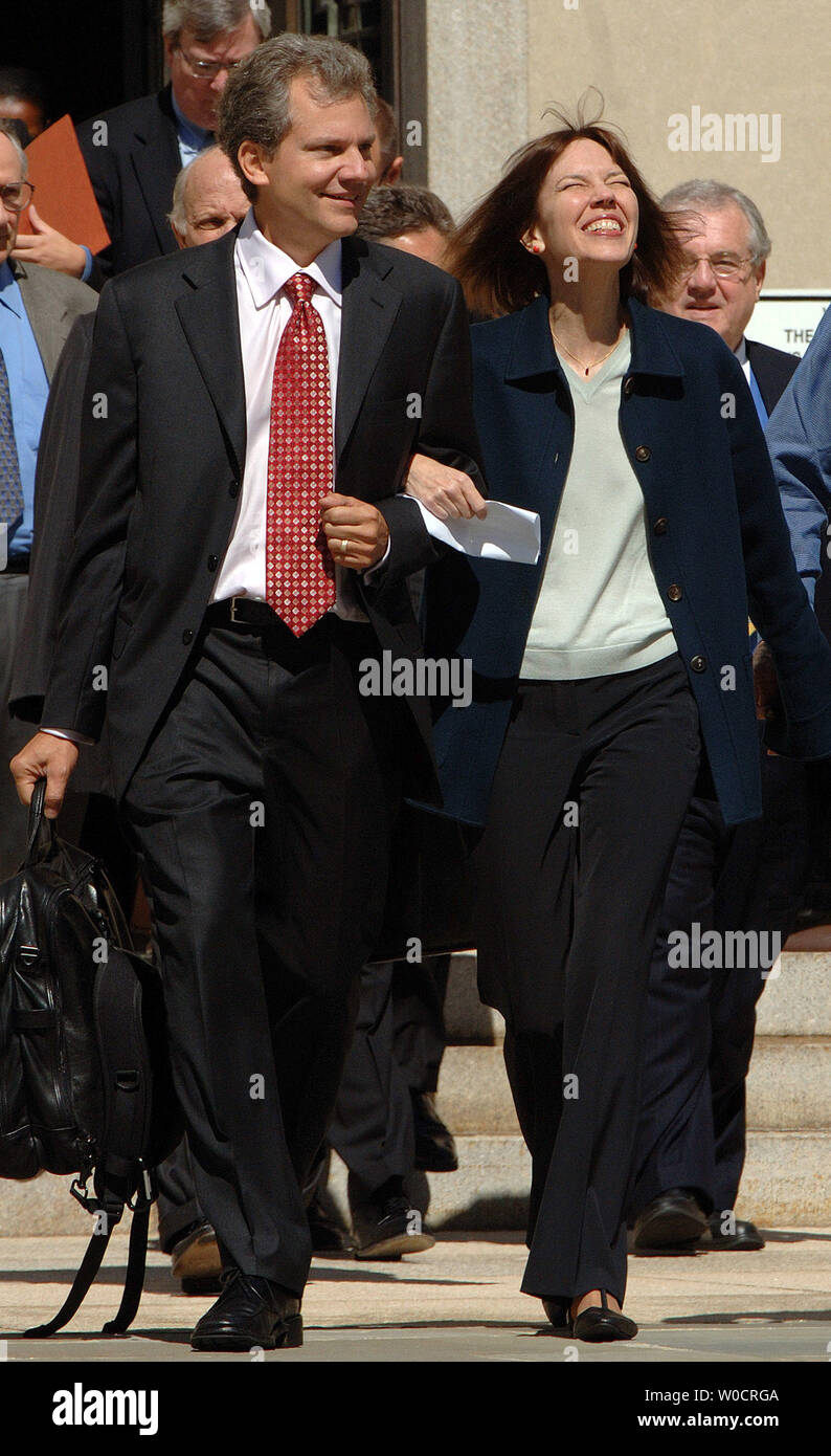 New York Times writer Judith Miller emerges from federal court all smiles, accompanied by New York Times Publisher Arthur Sulzberger, Jr., in Washington on Sept. 30, 2005. Miller, who spent nearly three months in jail for refusing to talk earlier, testified before a grand jury investigating the leaked name of a covert CIA agent after getting a release from her source.   (UPI Photo/Roger L. Wollenberg) Stock Photo