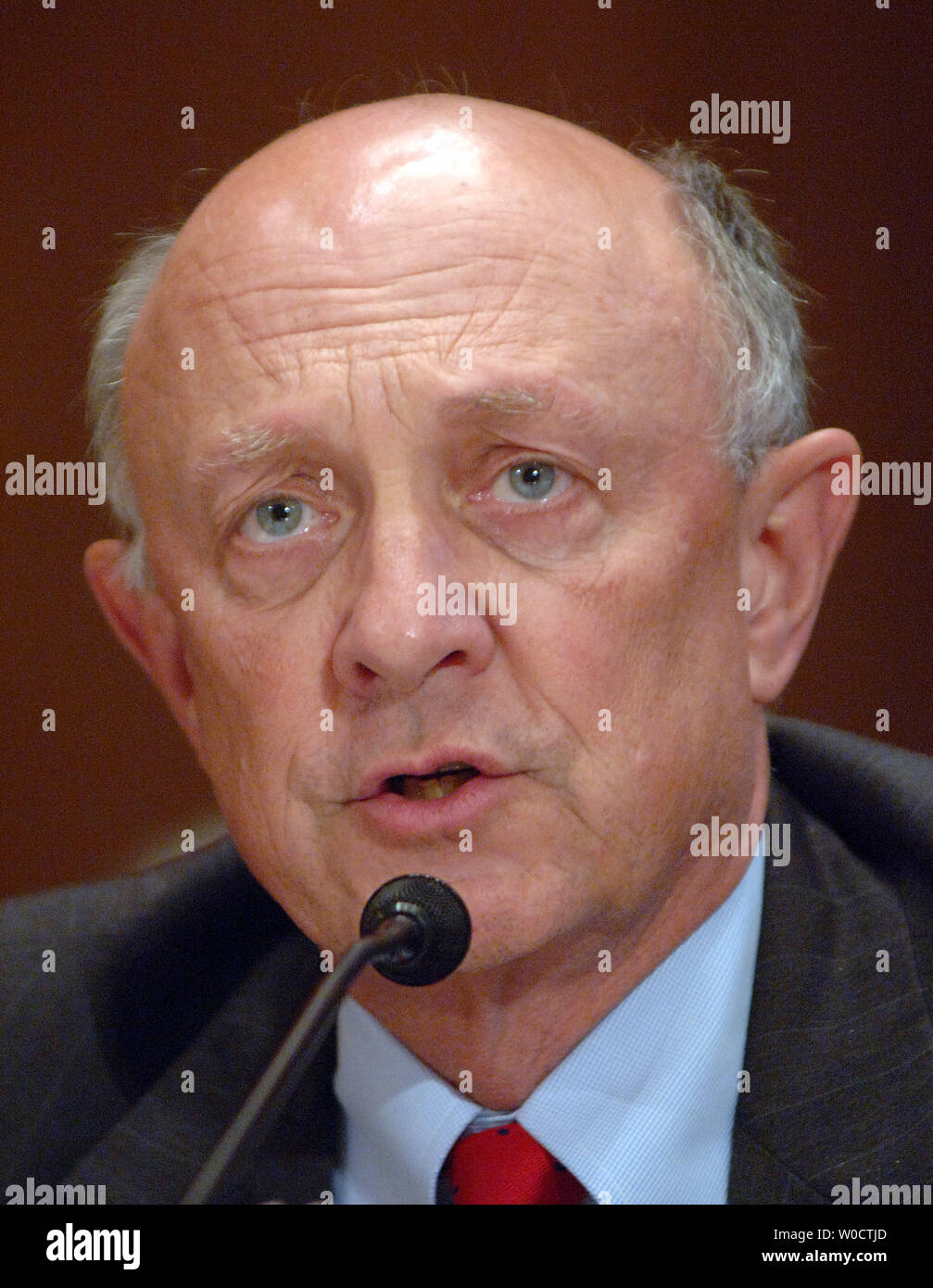 Former CIA Director James Woolsey testifies before the Senate Homeland Security and Governmental Affairs Committee about the risks Iran's nulcear program poses to world peace during a hearing on Capitol Hill in Washington on November 15, 2005. He and other witnesses agreed that Iran's attempts to gain nuclear weapons is a major threat, but  offered different views on how to curb the problem, including diplomatic, military and other solutions.   (UPI Photo/Roger L. Wollenberg) Stock Photo