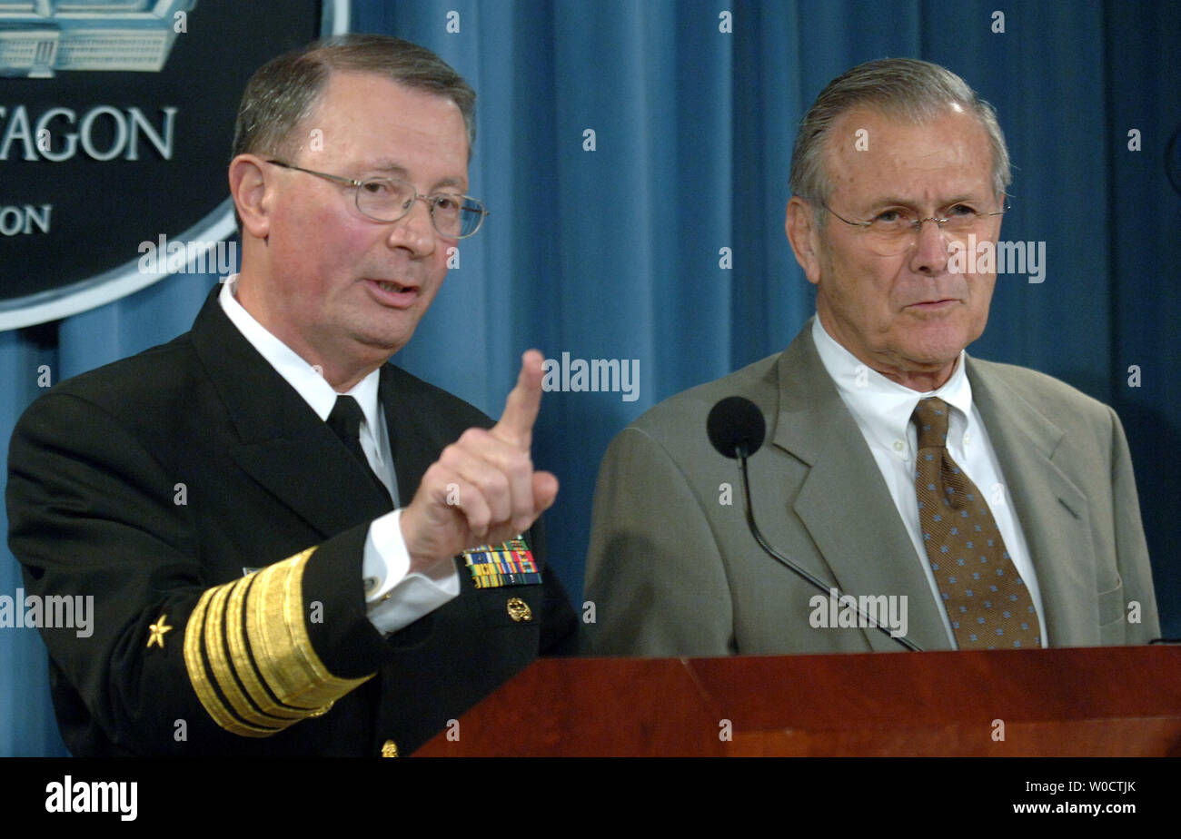 Vice Chairman, Joint Chiefs of Staff, Adm. Edmund Giambastiani (L) and Secretary of Defense Donald Rumsfeld speak at a press conference on the Iraq war during a joint press conference in the Pentagon on November, 15 2005. Rumsfield defended America’s reason for going to war restating that Saddam Hussein was a security threat to the United States and its allies. (UPI Photo/Kevin Dietsch) Stock Photo