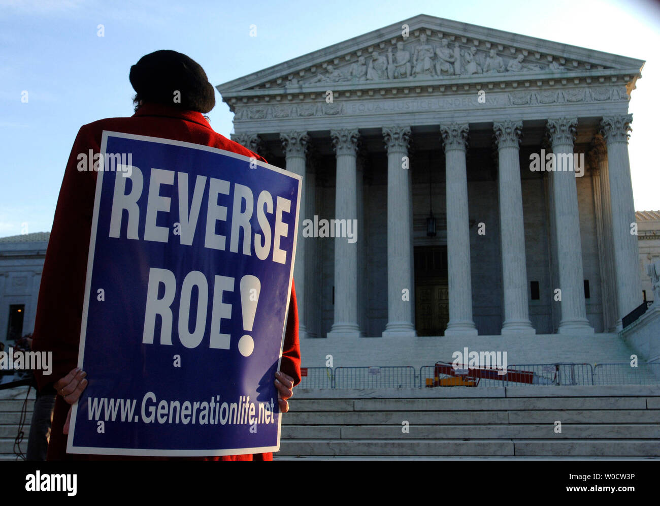 A Pro-Life demonstrator stands in front of the Supreme Court while the Court hears arguments on the Scheidler and Ayotte abortion case, in Washington on November 30, 2005. This is the third time abortion has come into debate in the Supreme Court. (UPI Photo/Kevin Dietsch) Stock Photo