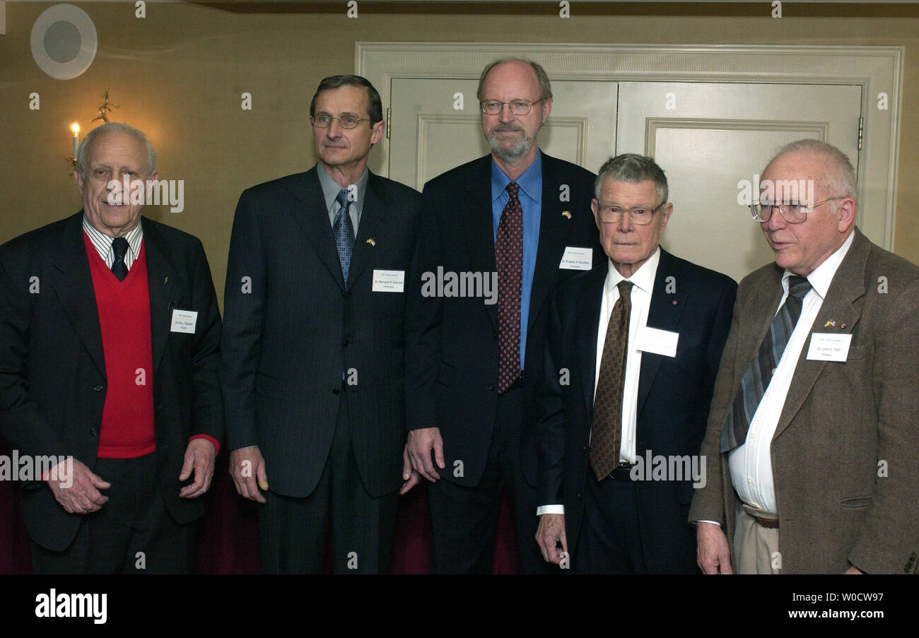 U.S. Nobel Prize Laureates, from the left, Roy Glauber, Richard Schrock, Robert Grubbs, Thomas Schelling and John Hall pose together during a photo opt at a press conference honoring their work in Washington on November 7, 2005. (UPI Photo/Kevin Dietsch) Stock Photo