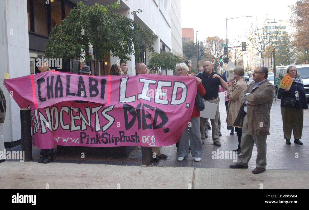 A group of protestors hold a rally against the Iraqi Deputy Prime Minister Ahmed Chalabi outside of the American Enterprise Institute where he was giving a speech on the rebuilding of Iraq in Washington on November, 9 2005. (UPI Photo/Kevin Dietsch) Stock Photo