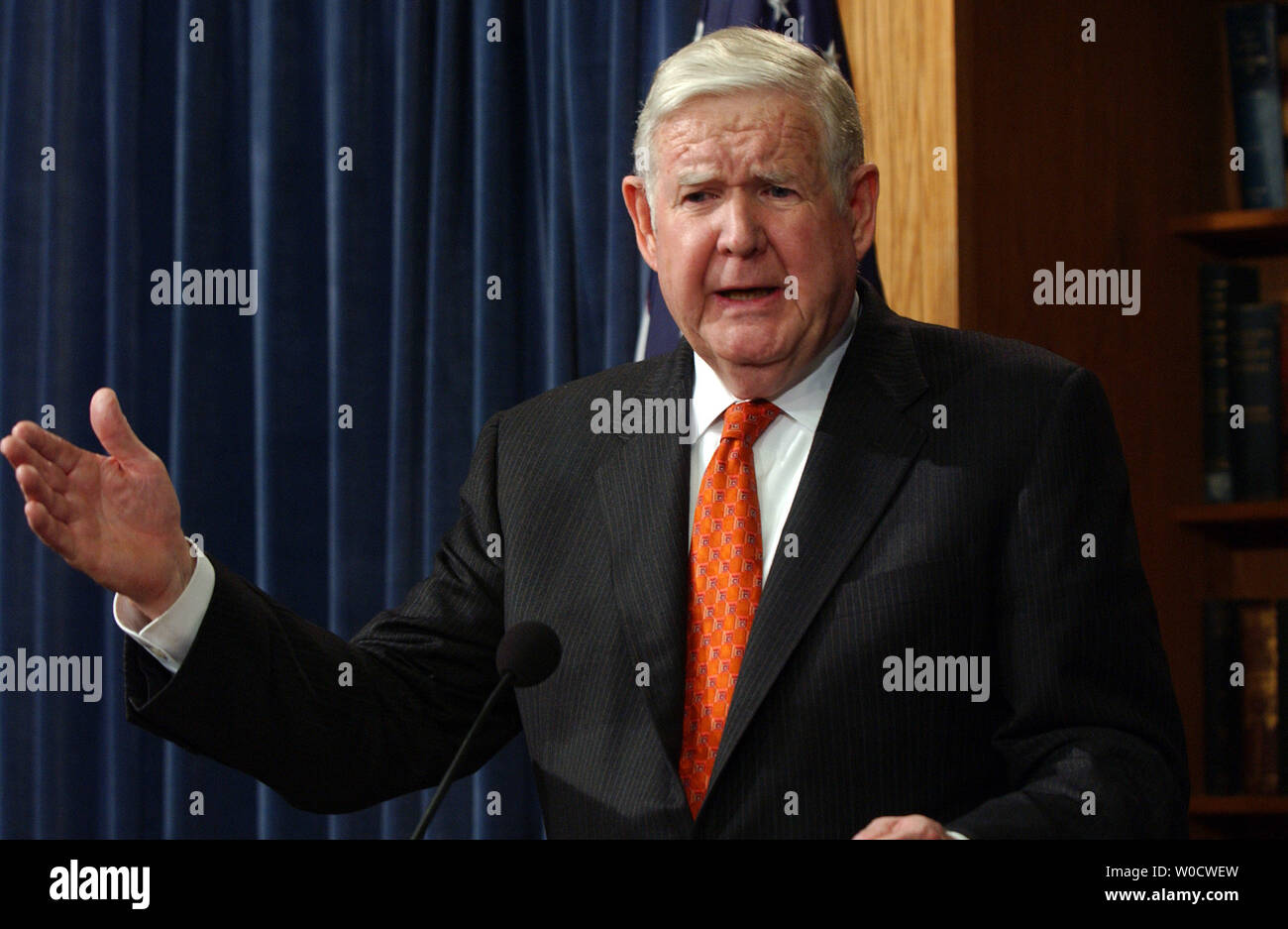 Rep. John Murtha, D-Pa., reacts to President Bush's speech on Iraq from earlier in the day during a news conference on Capitol Hill in Washington on December 7, 2005. Murtha reiterated his call for the U.S. to begin immediately withdrawing its troops because they are making the situation worse, not better.   (UPI Photo/Roger L. Wollenberg) Stock Photo
