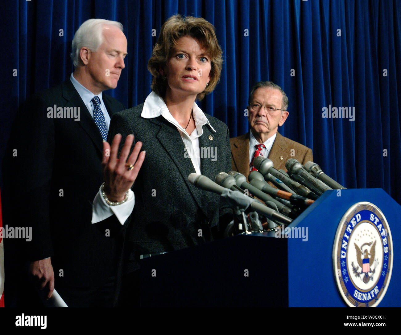 Sen. Lisa Murkowski (R-AK) speaks at a press conference on border security on Capitol Hill, in Washington on December 19, 2005. Sen. Murkowski was joined by Sen. John Cornyn (R-TX) (L) and Sen. Ted Stevens (R-AK) (UPI Photo/Kevin Dietsch) Stock Photo