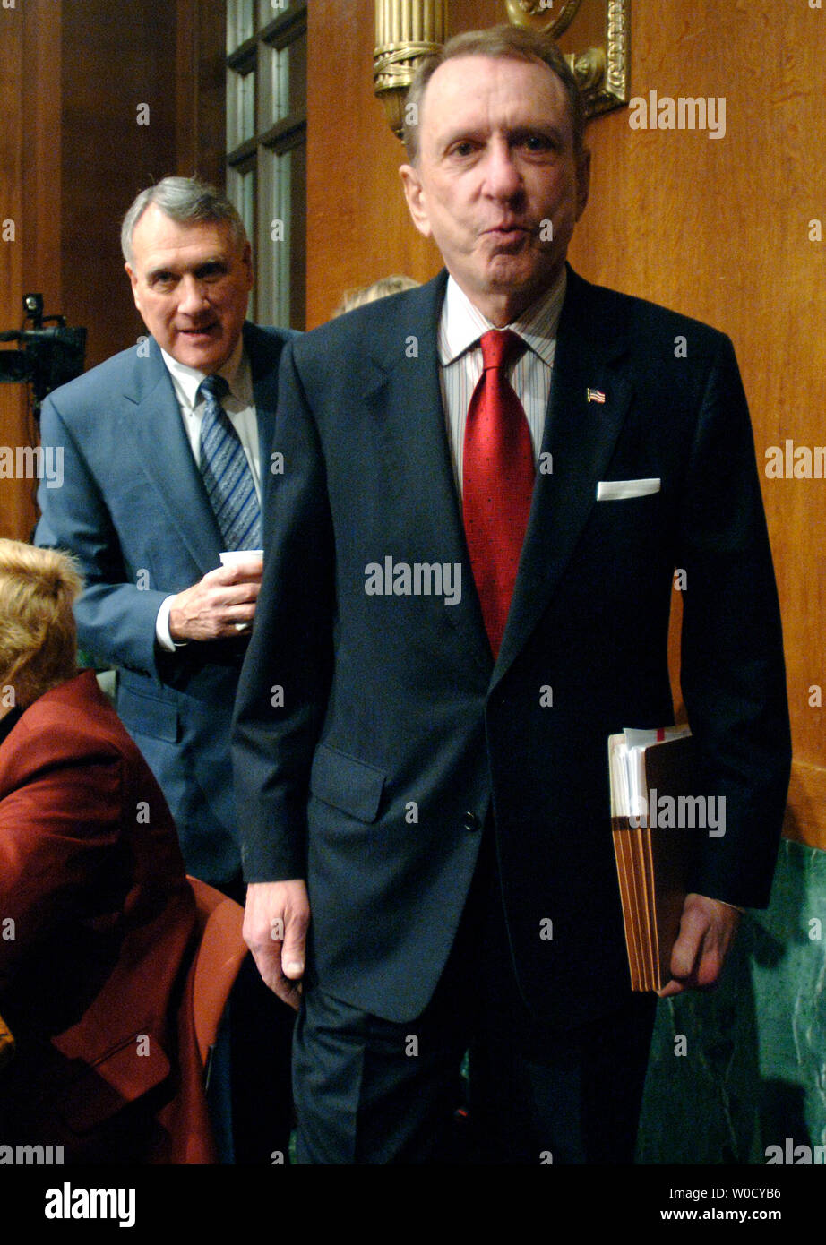 Chair of the Judiciary Committee Sen. Arlen Specter (R-Pa) followed by Sen. Charles Grasslley (R-IO) make their way to the Judicary Committee vote on the nomination of Samuel Alito to Justice of the Supreme Court, in Washington on January 24, 2006.  (UPI Photo/Kevin Dietsch) Stock Photo