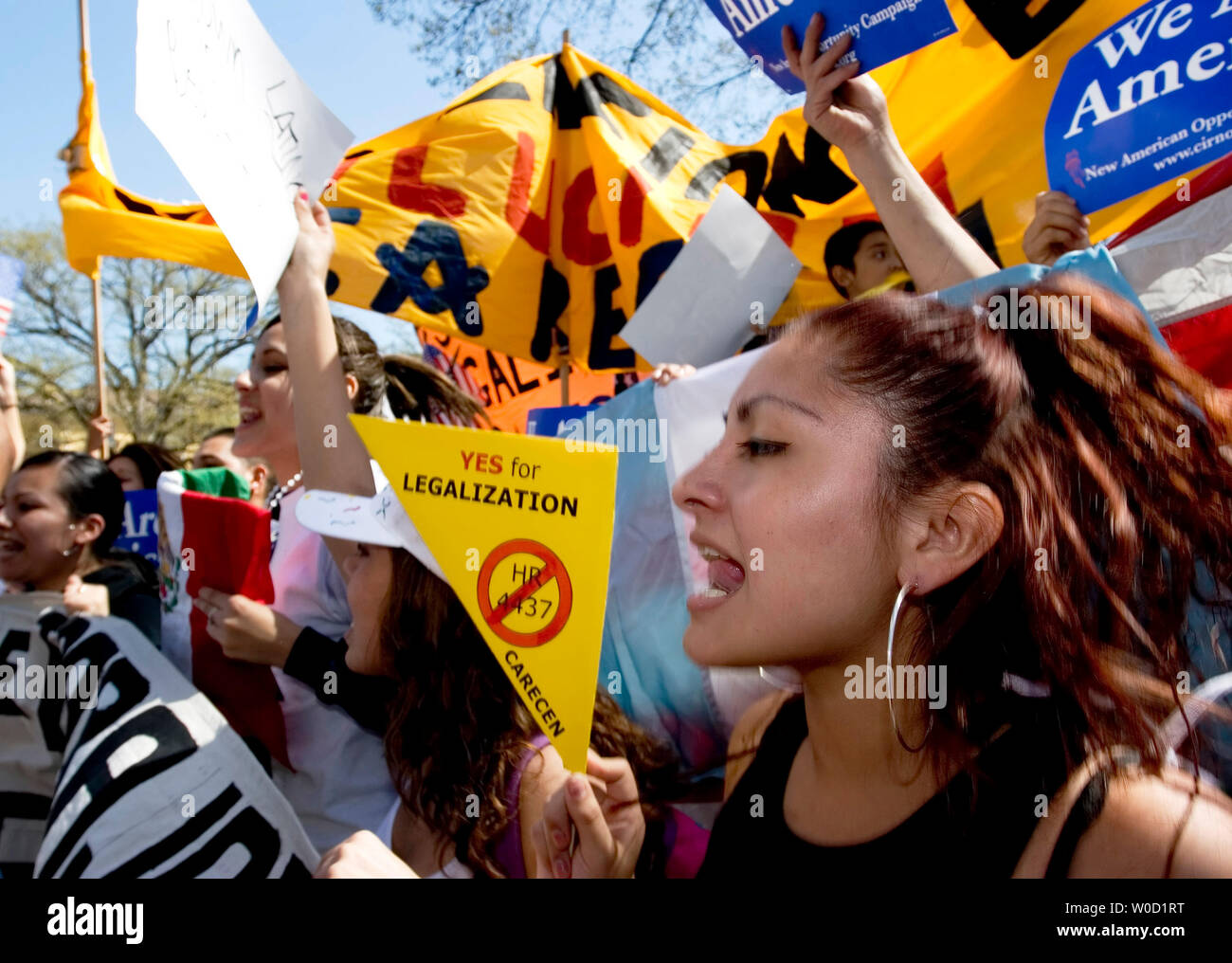 Estefani Pierola, 15, of Annandale, Va., cheers, "USA, USA" before the start of the march at Meridian Hill Park in Washington on April 10, 2006.  Tens of thousands of immigrants and their supporters rallied today against a House bill that would criminalize illegal immigrants and for reform measures that would protect their rights.  (UPI Photo/Chris Rossi) Stock Photo