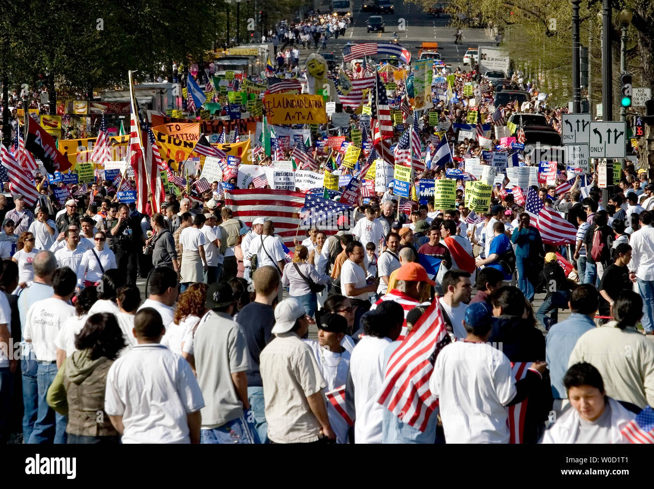 Tens of thousands of immigrants and their supporters march during a rally in Washington on April 10, 2006. Across the U.S. hundreds of thousands of protestors rallied today against a House bill that would criminalize illegal immigrants and for reform measures that would protect their rights.  (UPI Photo/Chris Rossi) Stock Photo
