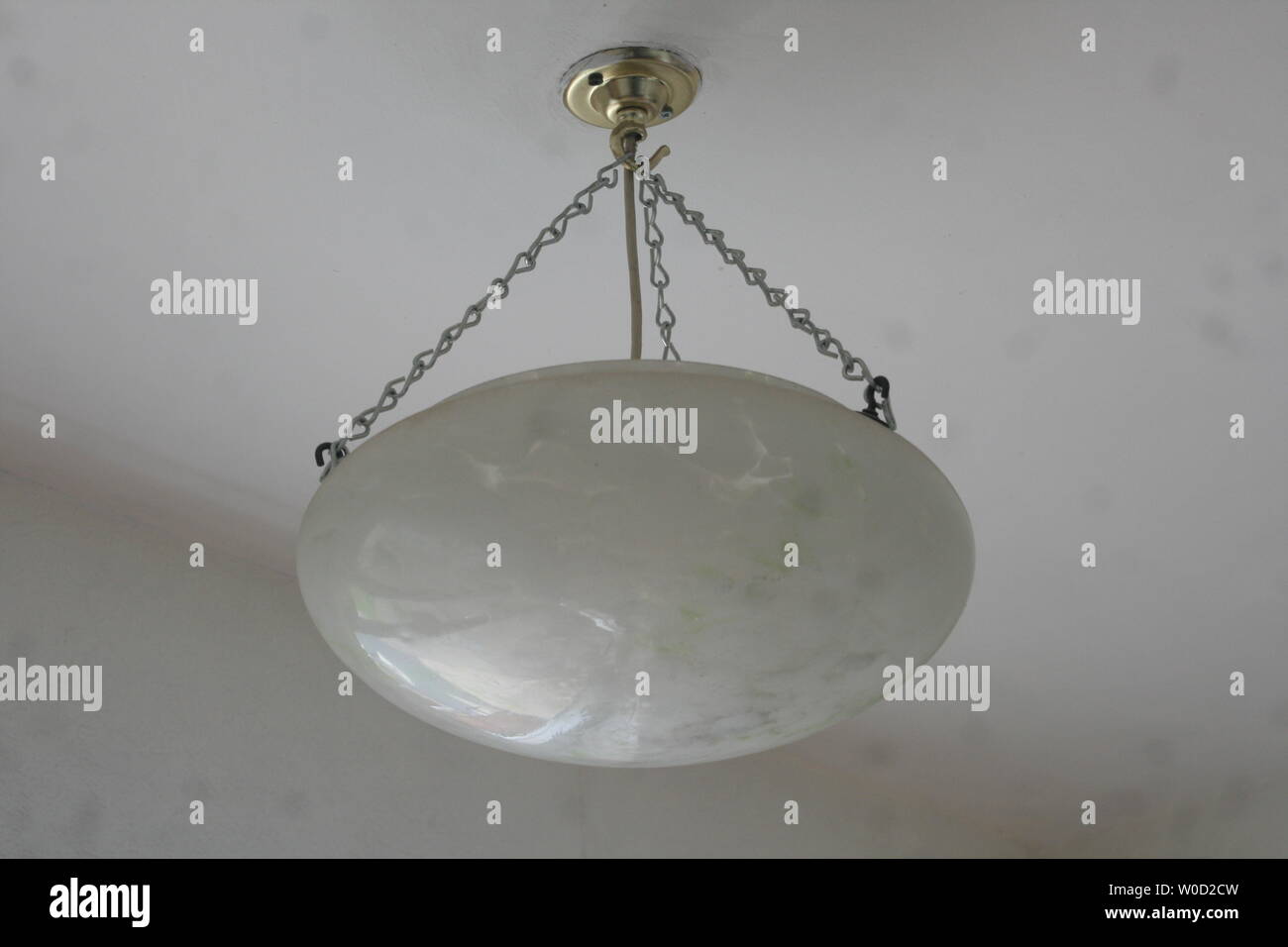 Art Deco   hanging ceiling , flycatcher light shade, 1930s glass shade Stock Photo