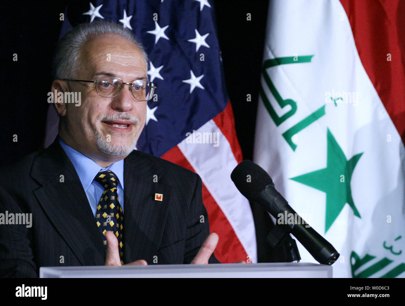 Iraqi Minister of Oil Hussein al-Shahristani answers reporters' questions at a joint press conference with the U.S. Energy Department Secretary at the Energy Department in Washington on July 26, 2006. The bureaucrats spoke of reestablishing Iraq's crude oil production to prewar levels and of establishing strategic partnerships between the two countries' energy sectors.  (UPI Photos/Eduardo Sverdlin) Stock Photo