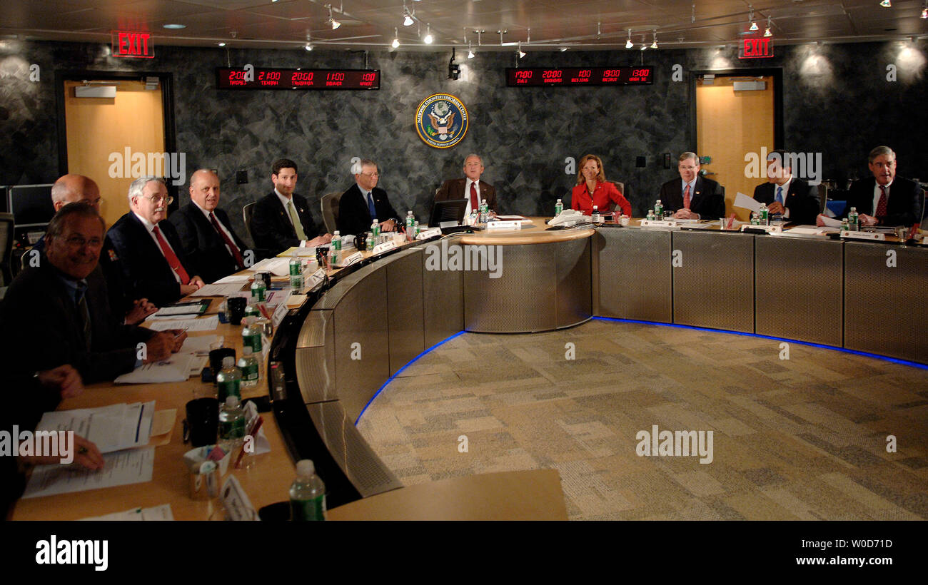 President George W. Bush (C) meets with the Homeland Security Team at the National Counterterrorism Center in McLean, Virginia on August 15, 2006.  (UPI Photo/Kevin Dietsch) Stock Photo