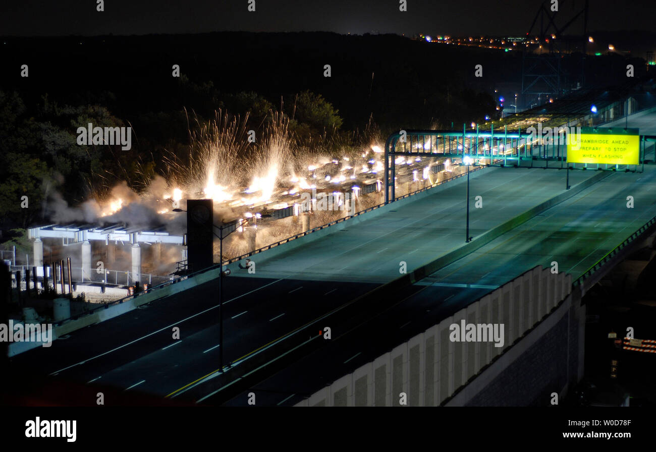 A section of the original Woodrow Wilson Bridge is demolished during an