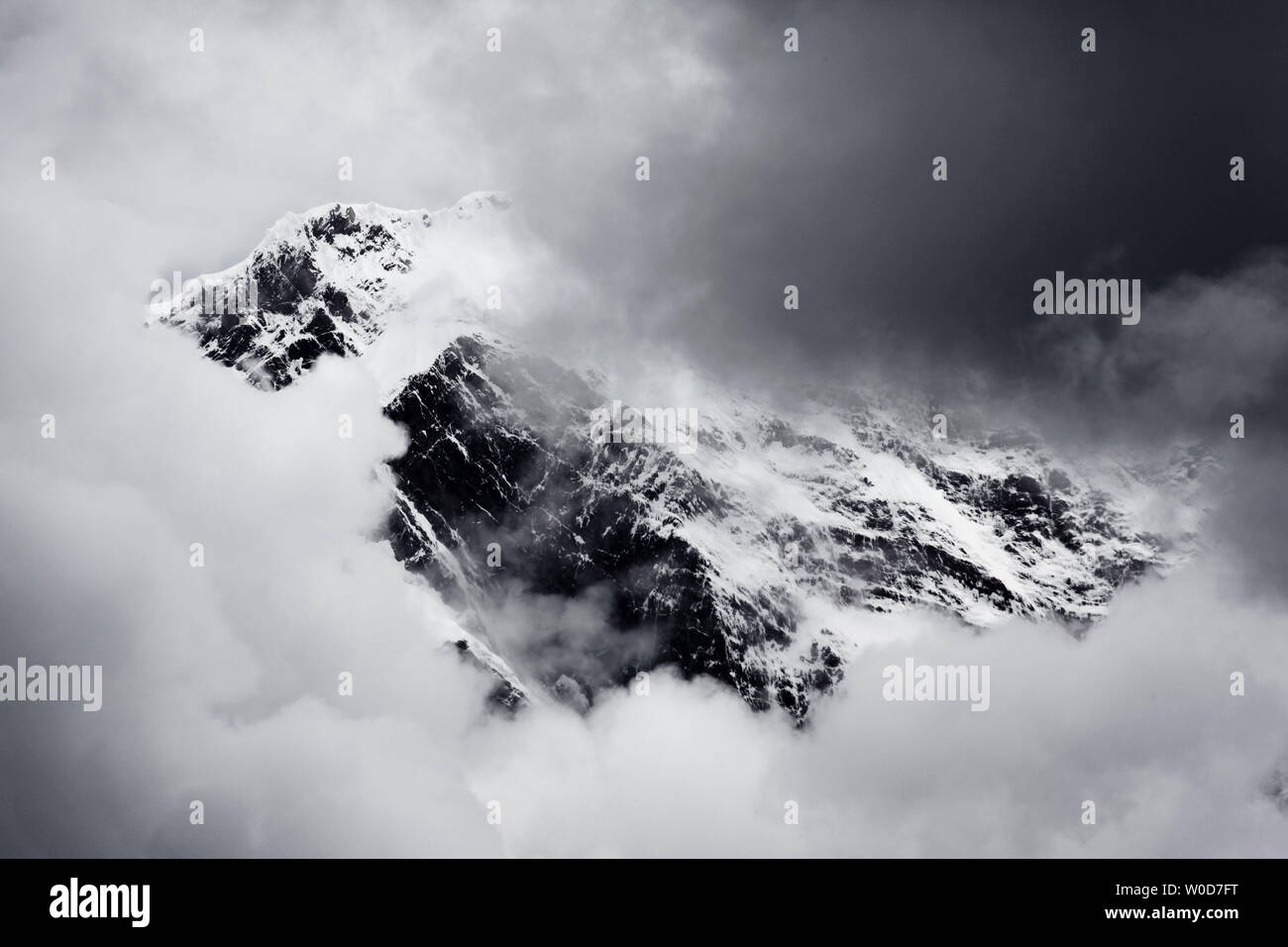 Mountain shrouded in clouds hi-res stock photography and images - Alamy
