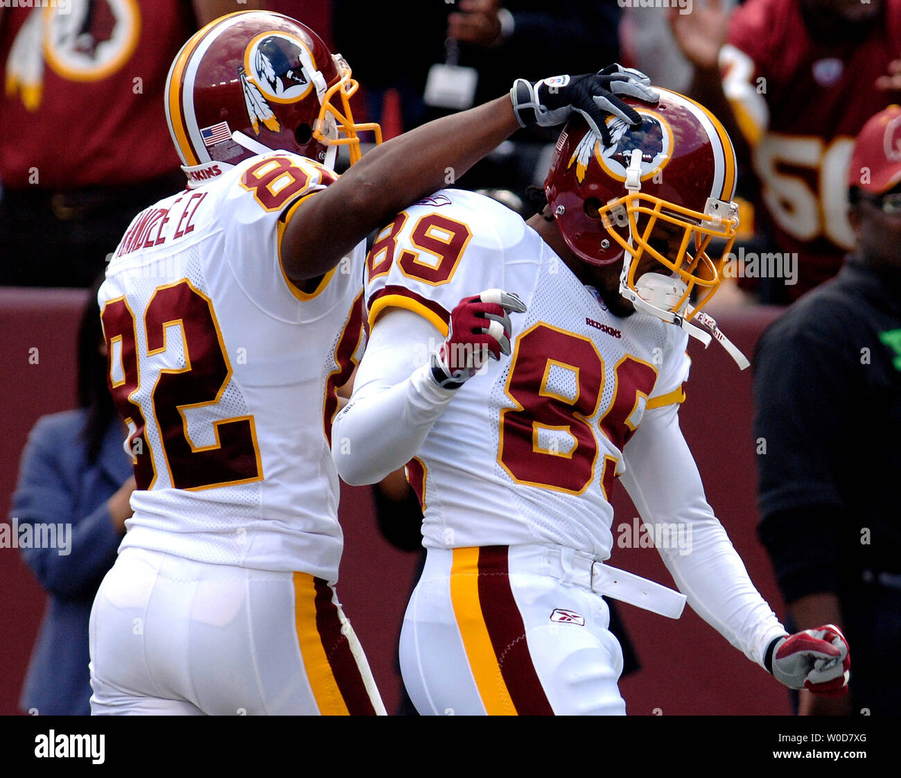 Washington Redskins Santana Moss (89) and Antwaan Randle El (82) celebrates Moss's 15 yard touchdown reception during the first quarter at Fed Ex Field, in Landover, MD on October 1, 2006. (UPI Photo/Kevin Dietsch) Stock Photo