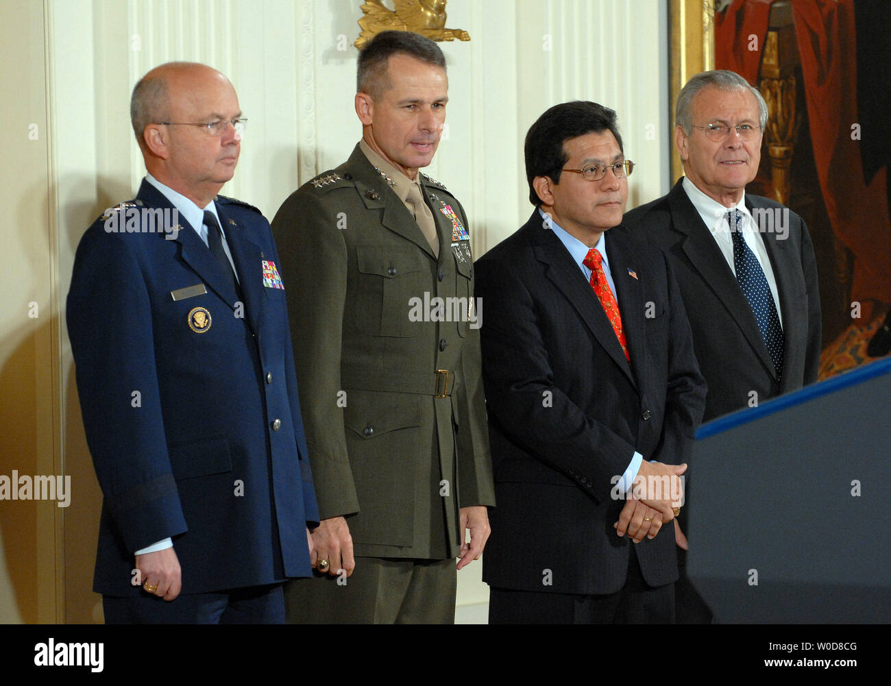 CIA Director Michael Hayden, Chairman of the Joint Chiefs of Staff Gen. Peter Pace, Att. Gen. Alberto Gonzales and Secretary of Defense Donald Rumsfeld (L to R) attend a ceremony to watch U.S. President George W. Bush sign S. 3930, the Military Commissions Act of 2006, a bill outlining the treatment of terrorism suspects, in the East Room of the White House on October 17, 2006.    (UPI Photo/Roger L. Wollenberg) Stock Photo