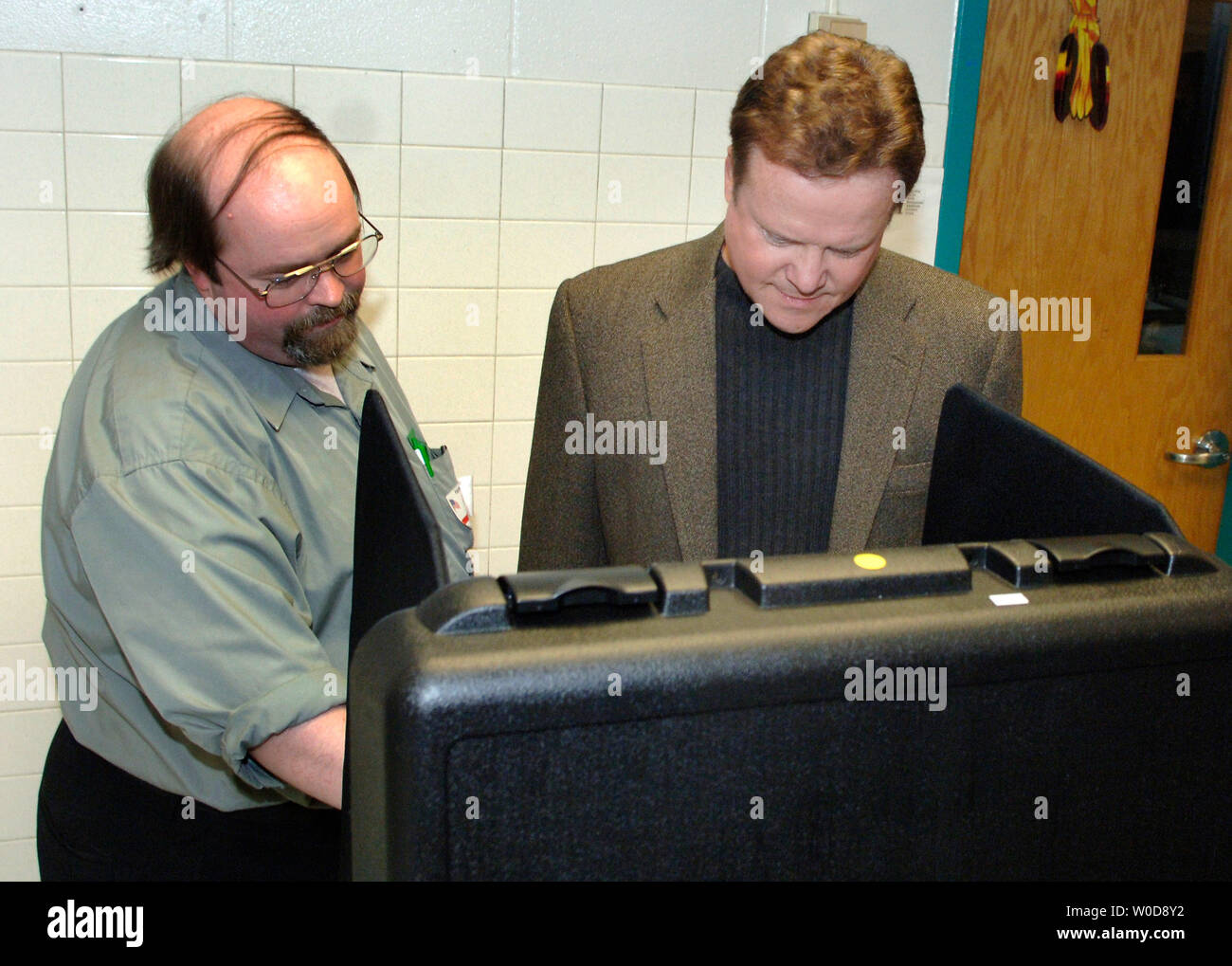 Democratic Senate candidate for Virginia Jim Webb is helped by an ...