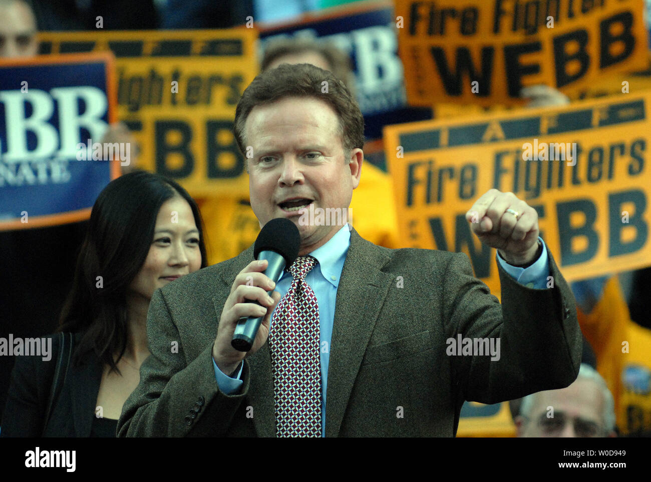 Virginia Democratic Senatorial Candidate Jim Webb, with wife Hong Lee with him on stage, speaks to supporters after his opponent Sen. George Allen (R-VA) conceded the closely contested Senate race on November 9, 2006, in Arlington, Virginia.    (UPI Photo/Roger L. Wollenberg) Stock Photo