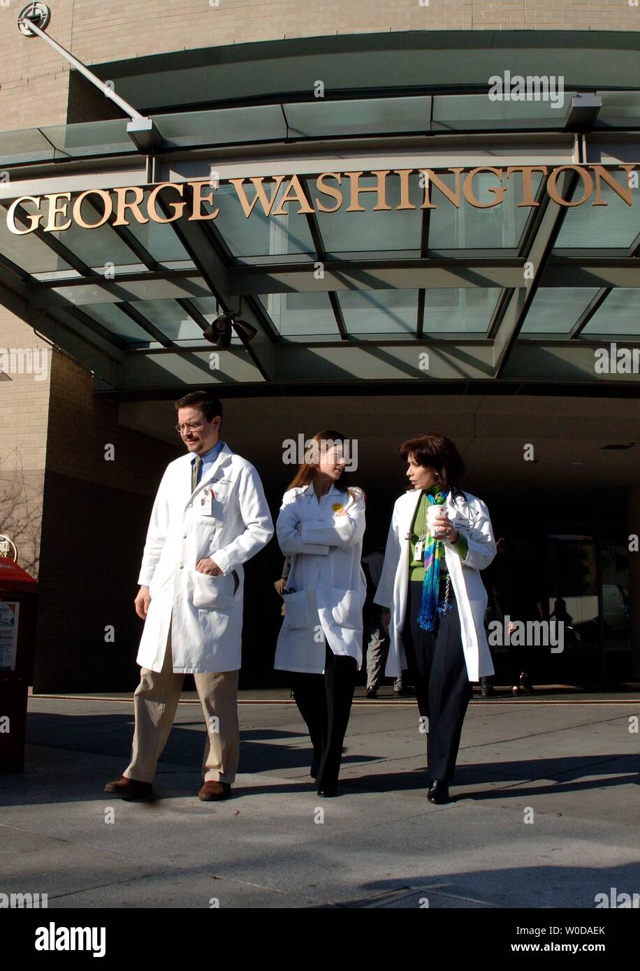Doctors leaves The George Washington University Hospital in Washington on December 14, 2006.  Sen. Tim Johnson (D-SD) still remains hospitalized inside after suffering a brain hemorrhage yesterday on Capitol Hill. (UPI Photo/Kevin Dietsch) Stock Photo