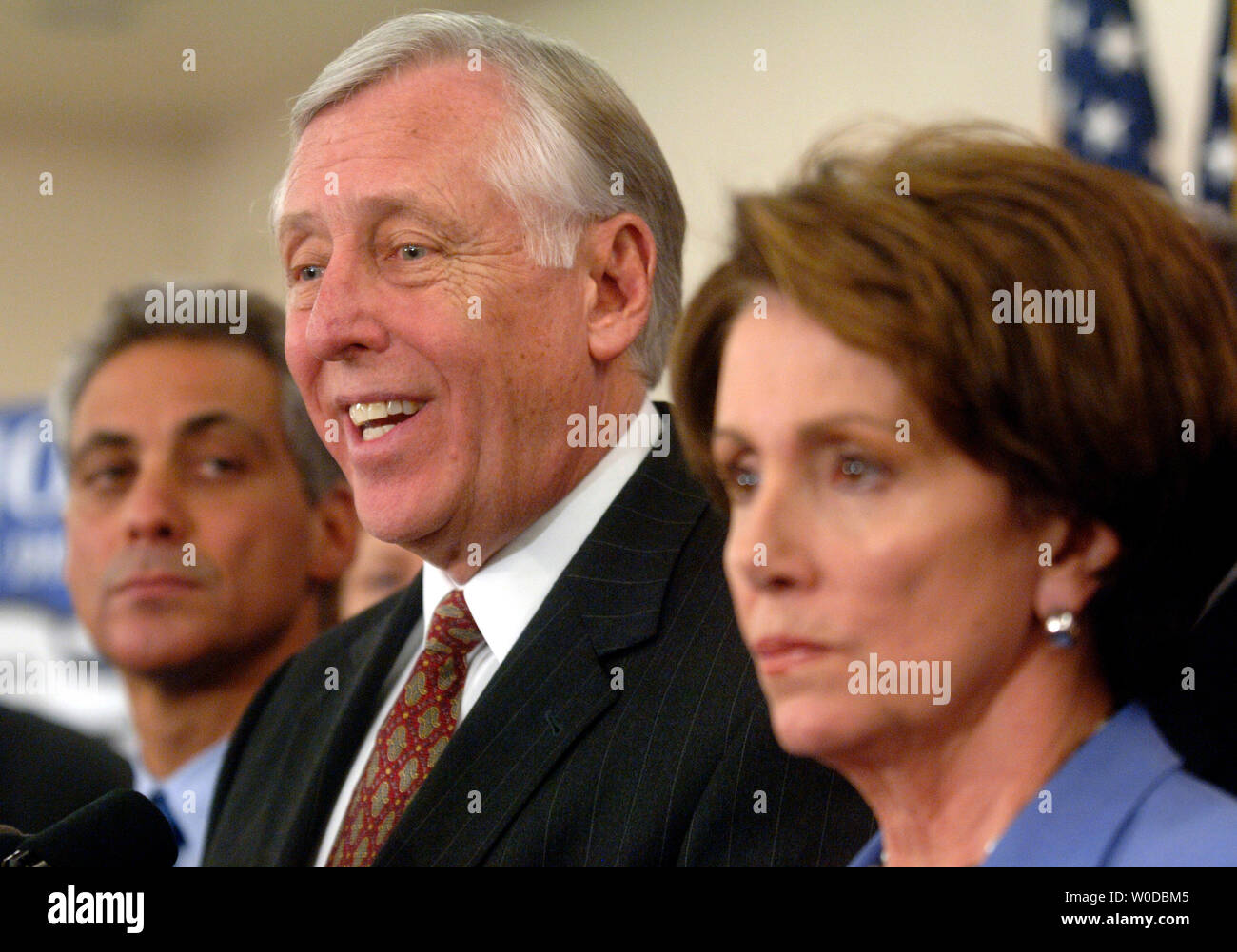 House Majority Leader Steny Hoyer (D-MD) (C) speaks alongside Speaker of the House Nancy Pelosi (D-CA) (R) and Rep. Rahm Emanuel (D-IL) at a press conference marking the first 100 legislative hours of the new Congress, in Washington on January 18, 2007. (UPI Photo/Kevin Dietsch) Stock Photo