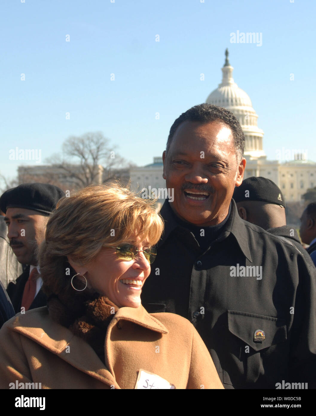 Actress/activist Jane Fonda (R) and Reverend Jesse Jackson talk behind the stage at a peace rally on the National Mall in Washington on January 27, 2007. Tens of thousands of protesters marched to the Capitol against the Iraq War. (UPI Photo/Alexis C. Glenn) Stock Photo