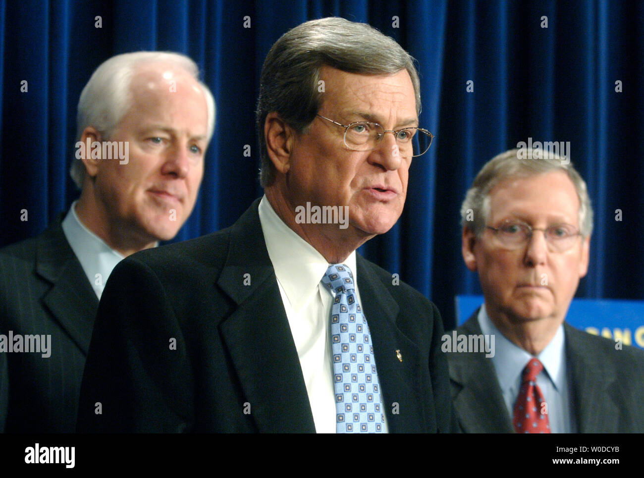 Assistant Minority Leader Trent Lott (R-MS) (C) speaks about the Senate GOP Agenda for the 110th Congress, in Washington on February 15, 2007. Lott was joined by Sen. John Cornyn (R-TX) (L) and John Kyl (R-AZ). (UPI Photo/Kevin Dietsch) Stock Photo