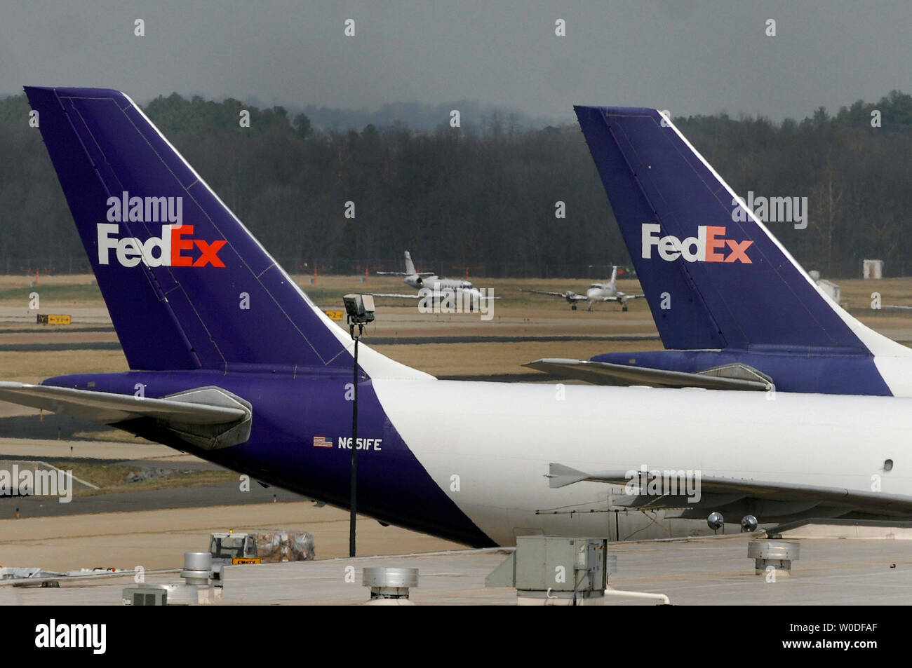 The tail wings of two FedEx cargo planes are seen at Washington Dulles International Airport, in Dulles, Virginia on March 26, 2007. (UPI Photo/Kevin Dietsch) Stock Photo