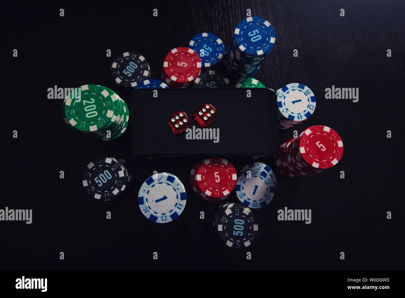 Online Casino Gambling Concept Smartphone Blank Screen On Chips Stack And Playing Dice Over Black Table Background People Entertainment Play Mobile Stock Photo Alamy